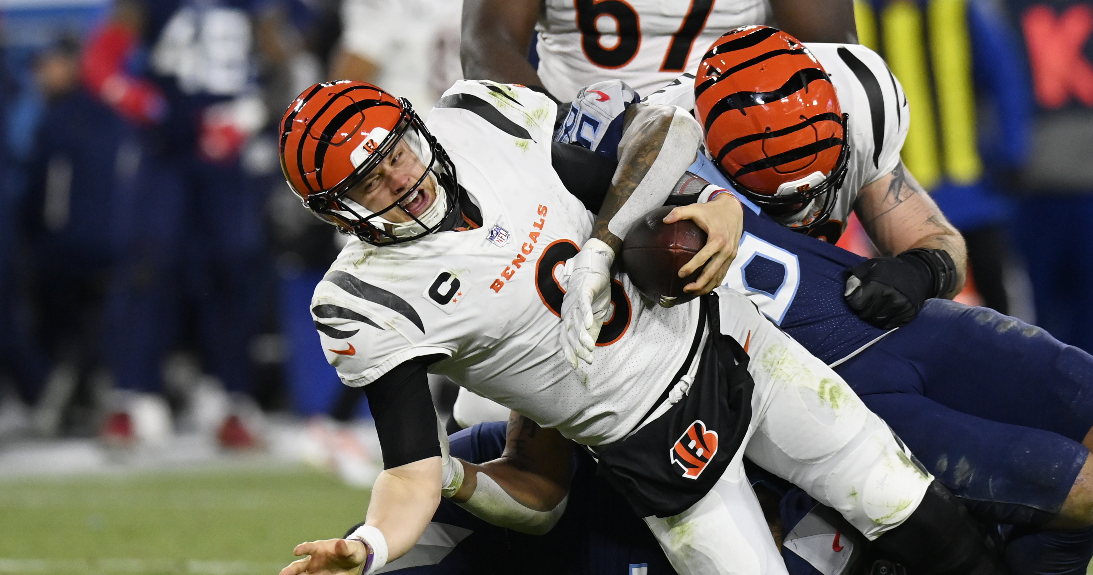 Cincinnati Bengals quarterback Joe Burrow (9) throws against the Tennessee  Titans during the second half of an NFL Divisional Playoff game at Nissan  Stadium in Nashville, Tennessee, on Saturday, January 22, 2022.