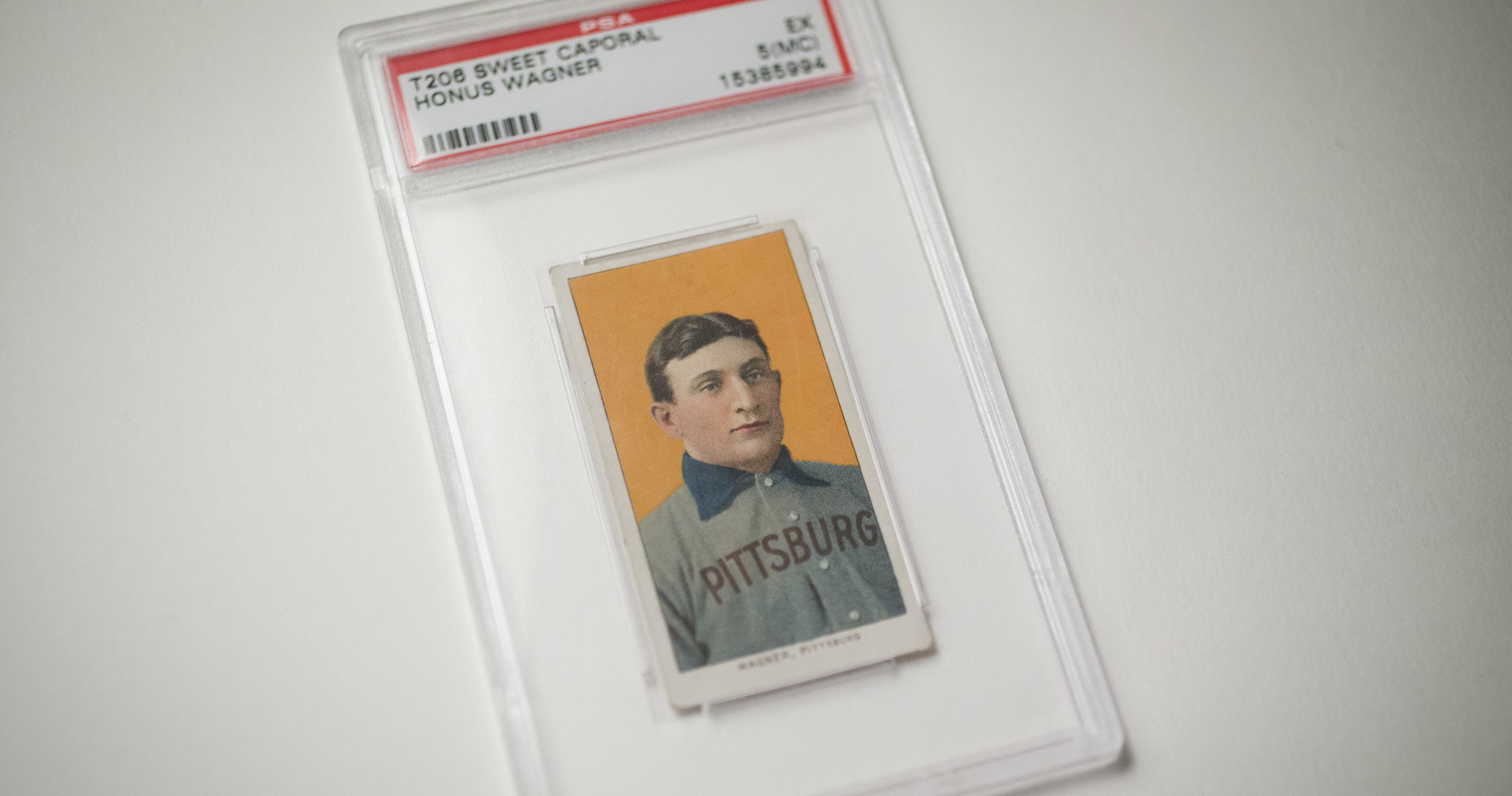 Half of a T206 Honus Wagner card sells for more than $475K in