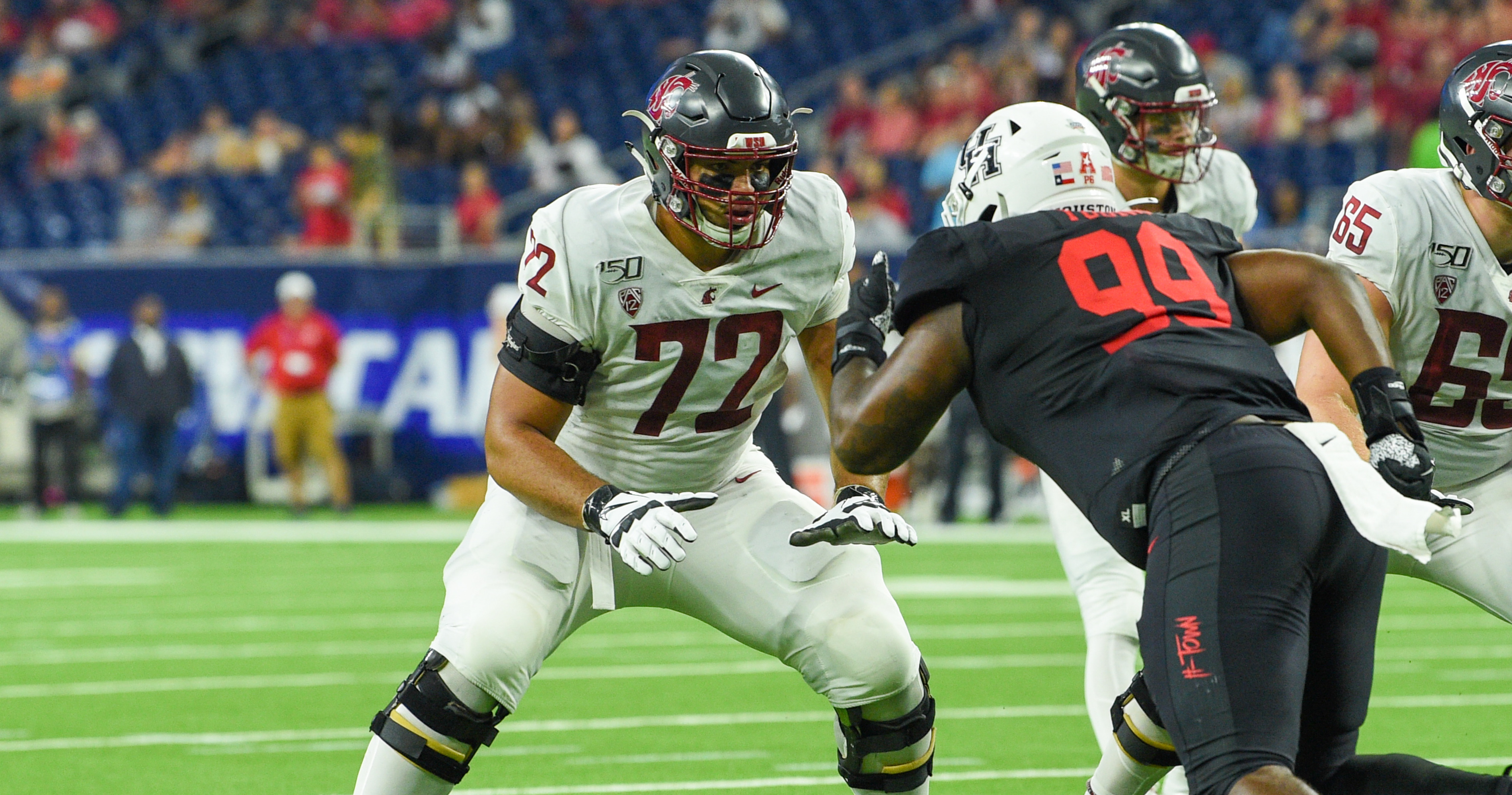 Seattle Seahawks offensive tackle Abraham Lucas (72) gets set