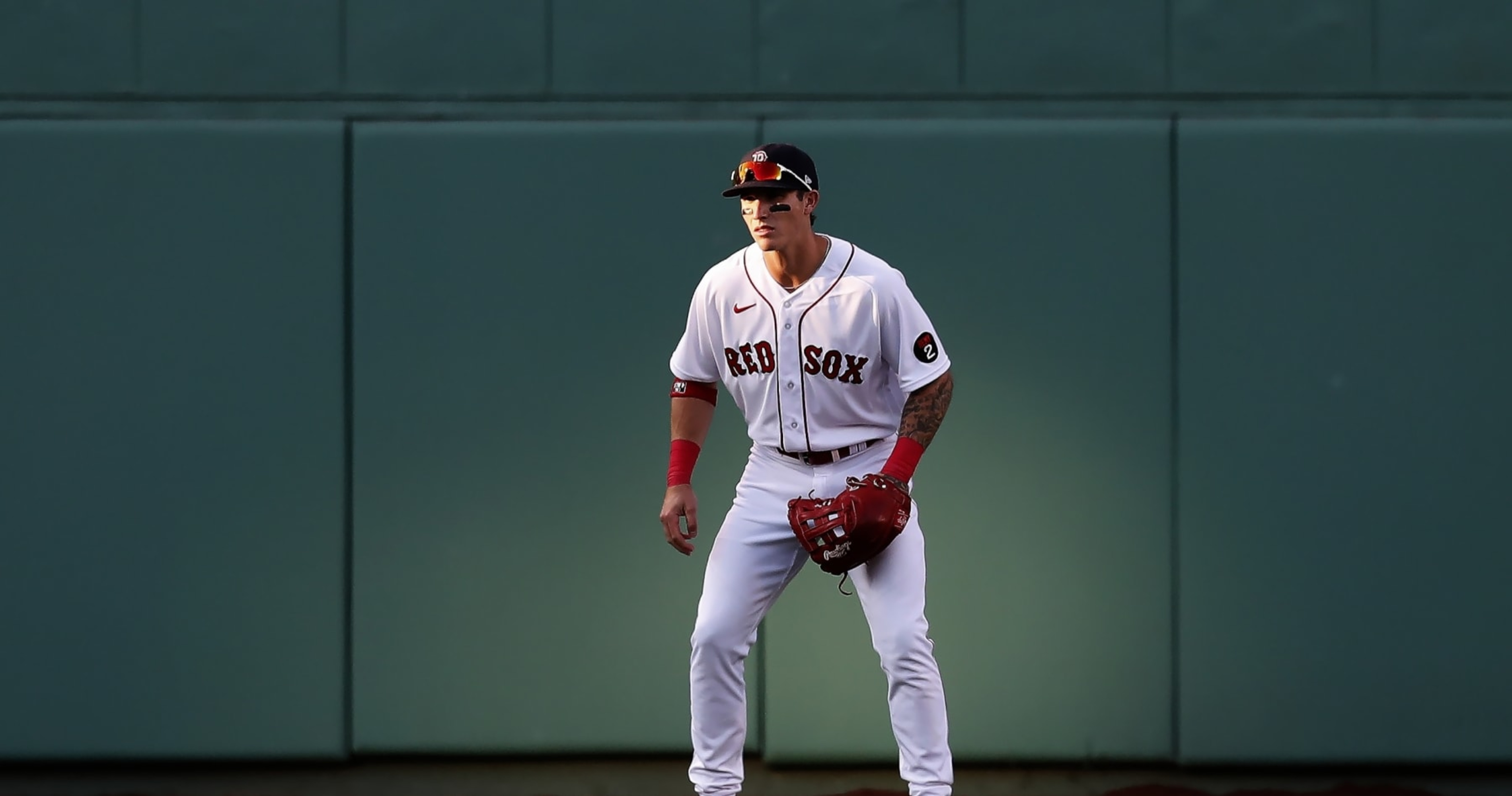 Boston Red Sox center fielder Jarren Duran throws the ball after making a  catch in the first inning of a baseball game between the Baltimore Orioles  and the Boston Red Sox, Wednesday