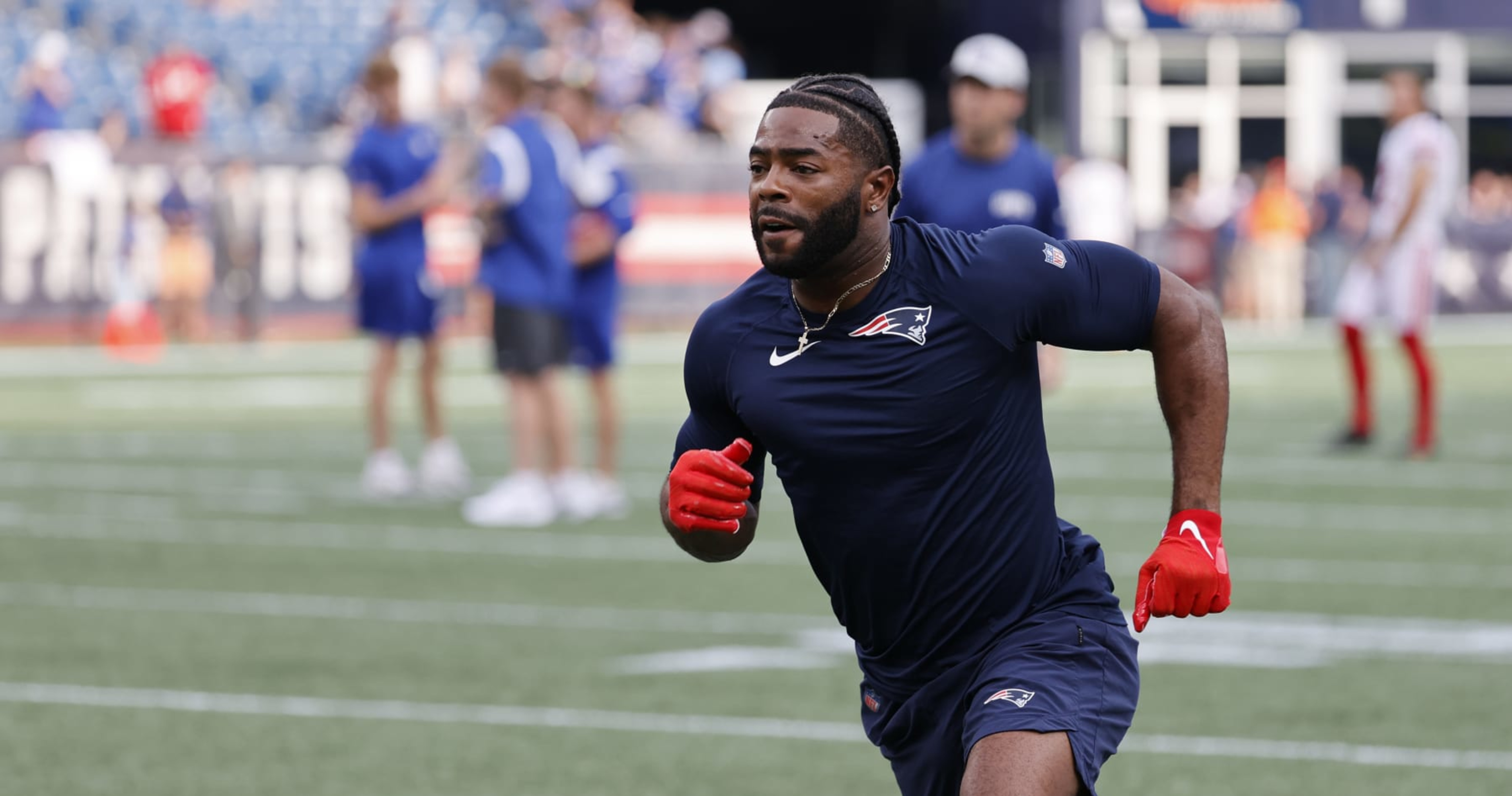 FILE - New England Patriots defensive back Malcolm Butler wipes