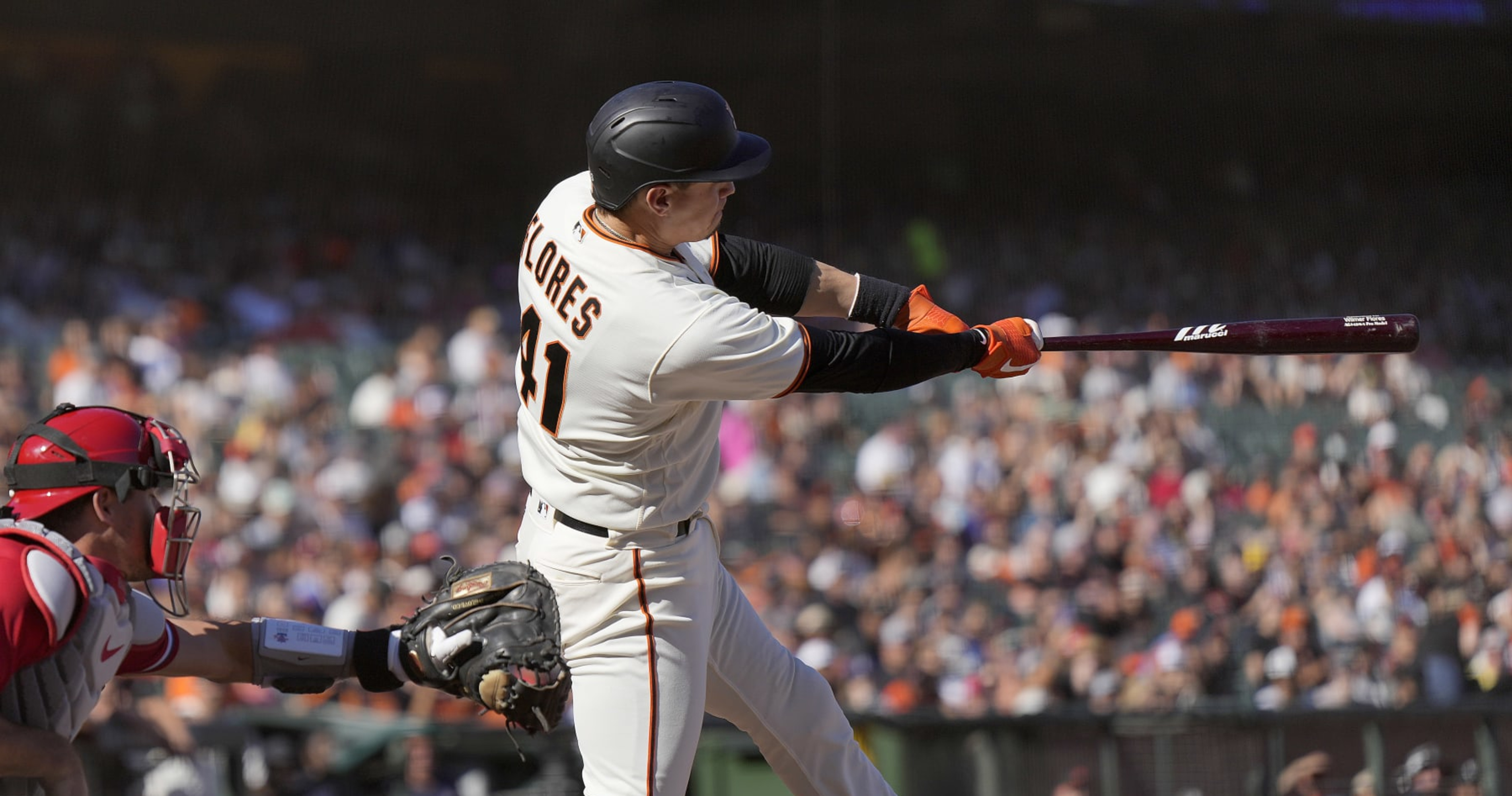 SF Giants' Wilmer Flores homers, exits game vs. Astros