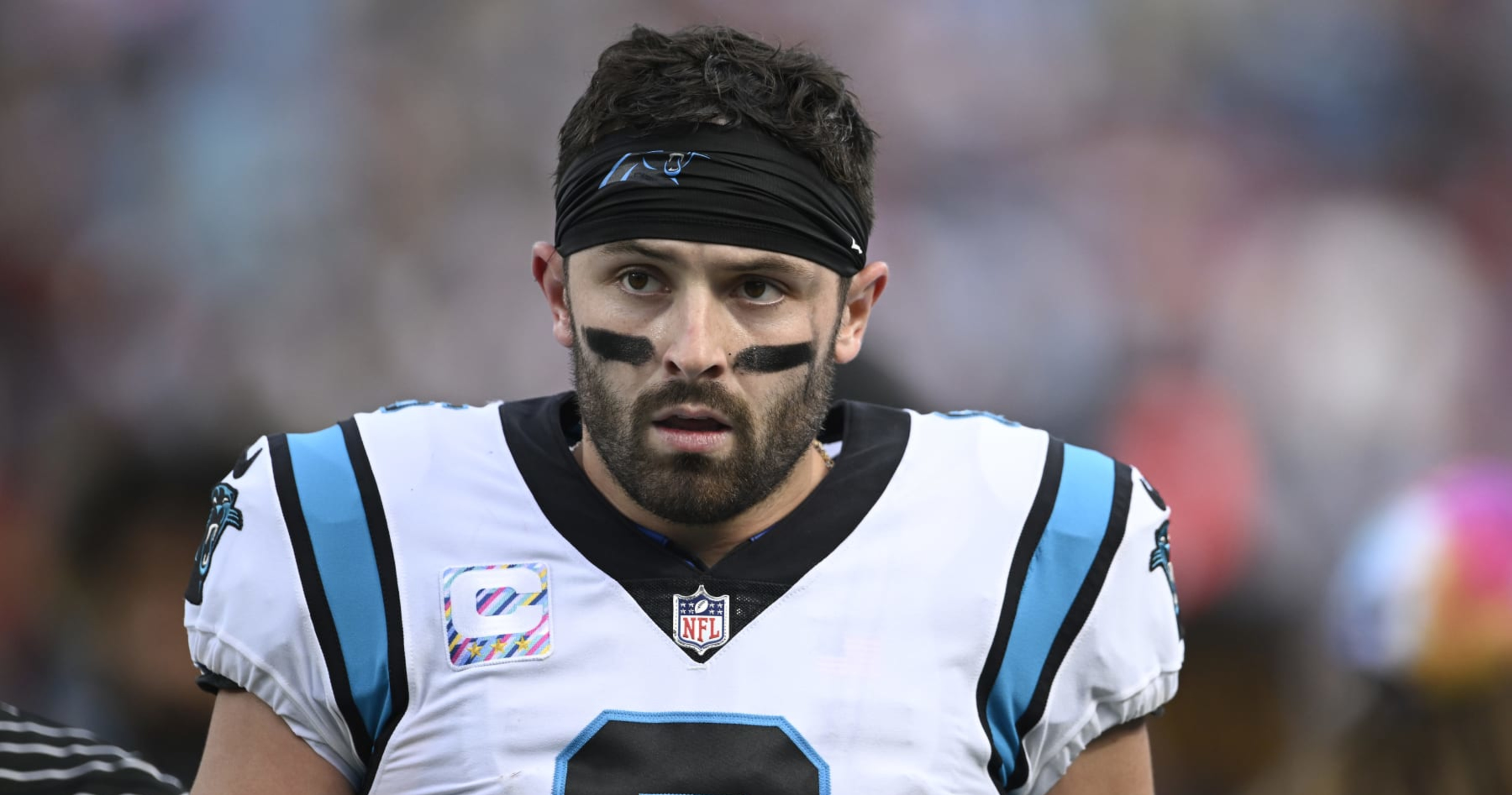 Carolina Panthers quarterback P.J. Walker (6) runs off the field