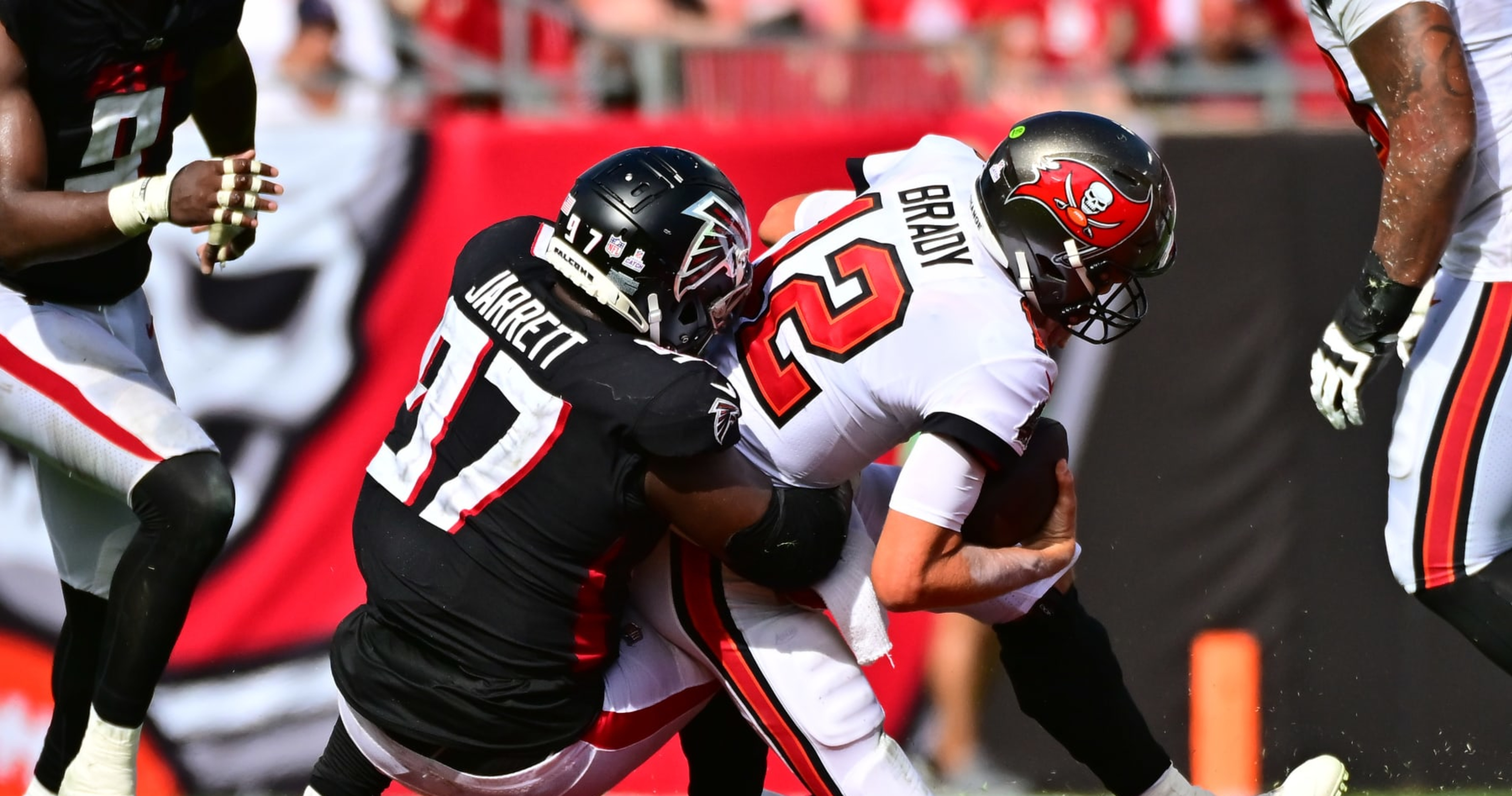 Report: Tom Brady Facing Fine for Apparent Kick at Grady Jarrett on Roughing Penalty thumbnail