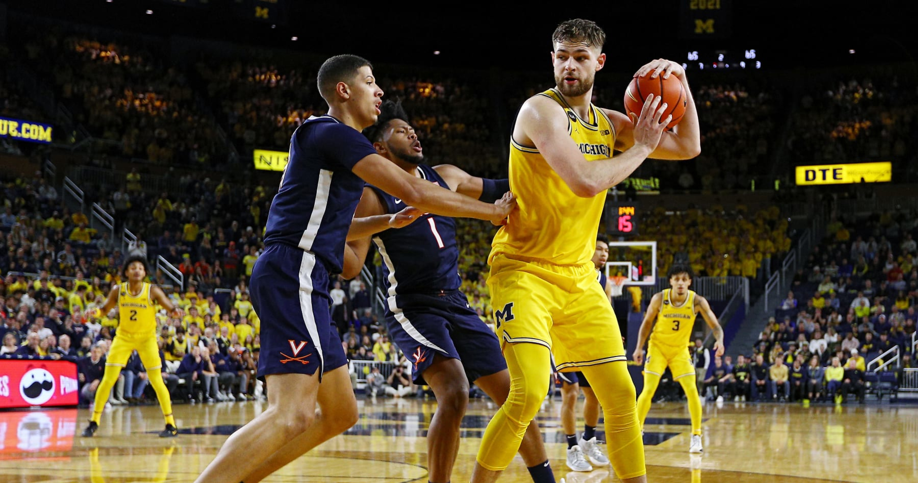 Hunter Dickinson Criticized as Dirty Player After Michigan's Loss to No. 3 Virgi..