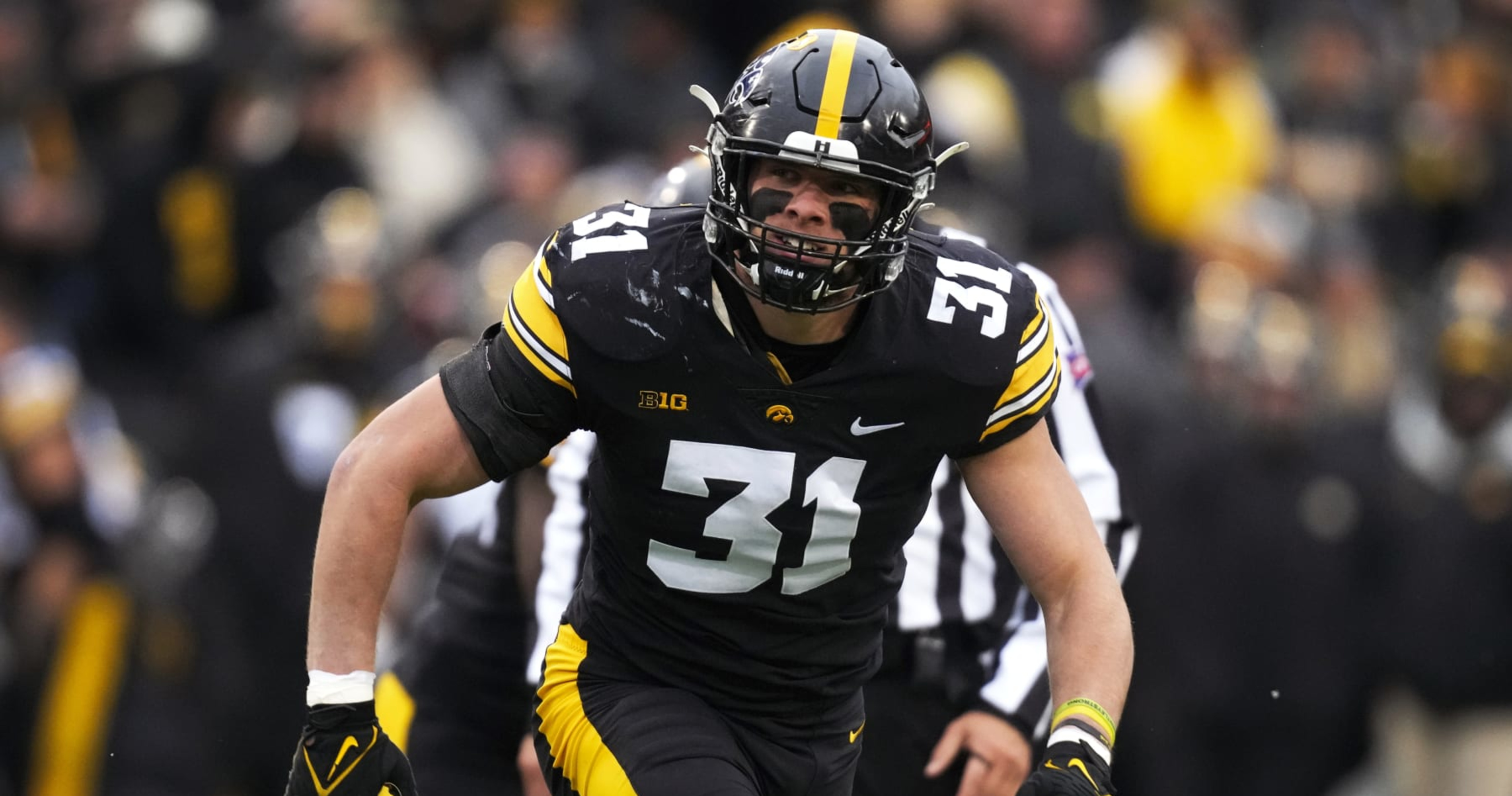 What came first- the black and gold uniforms of the Iowa Hawkeyes