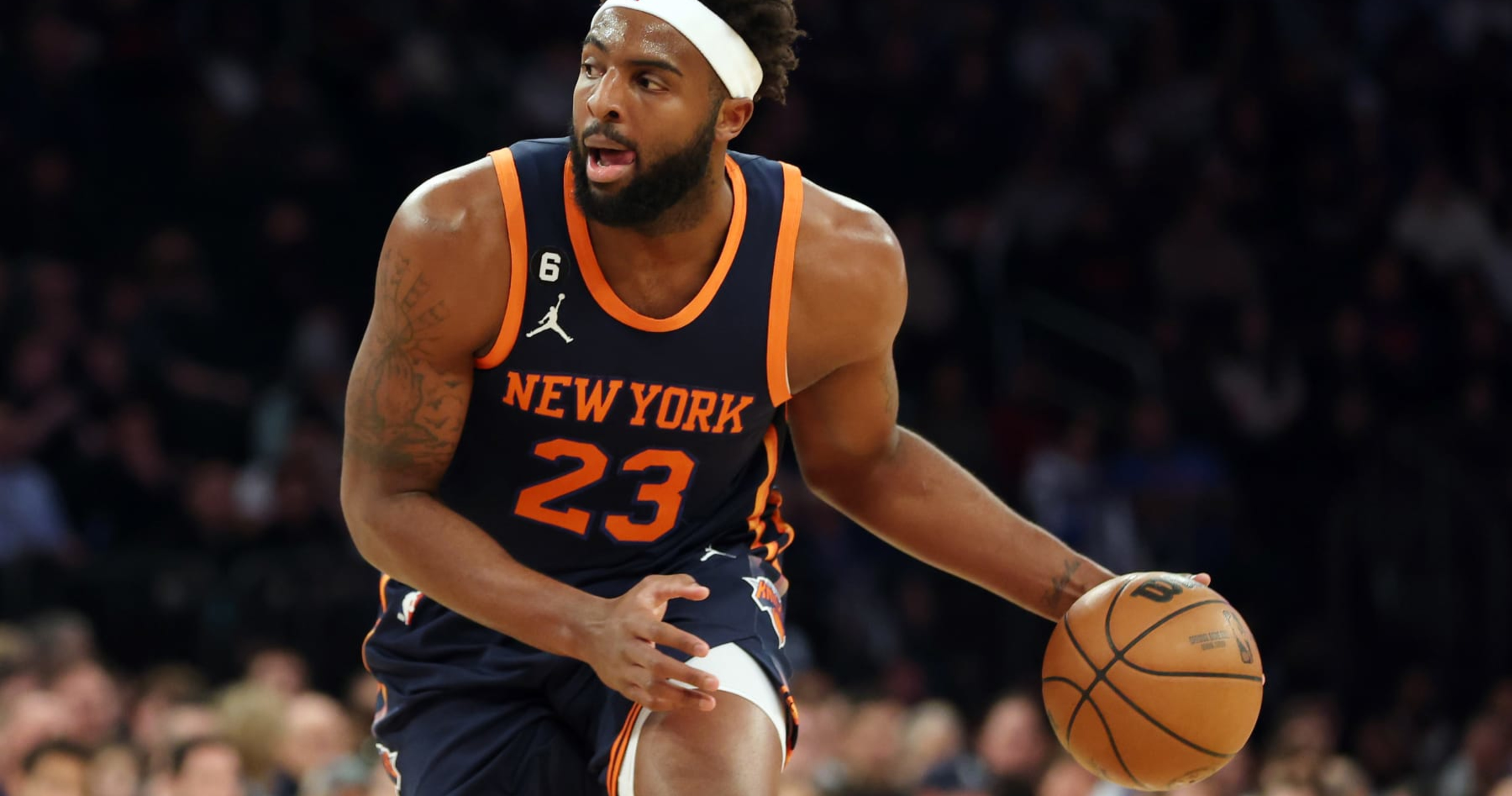 New York Knicks center Mitchell Robinson (23) grabs a rebound over