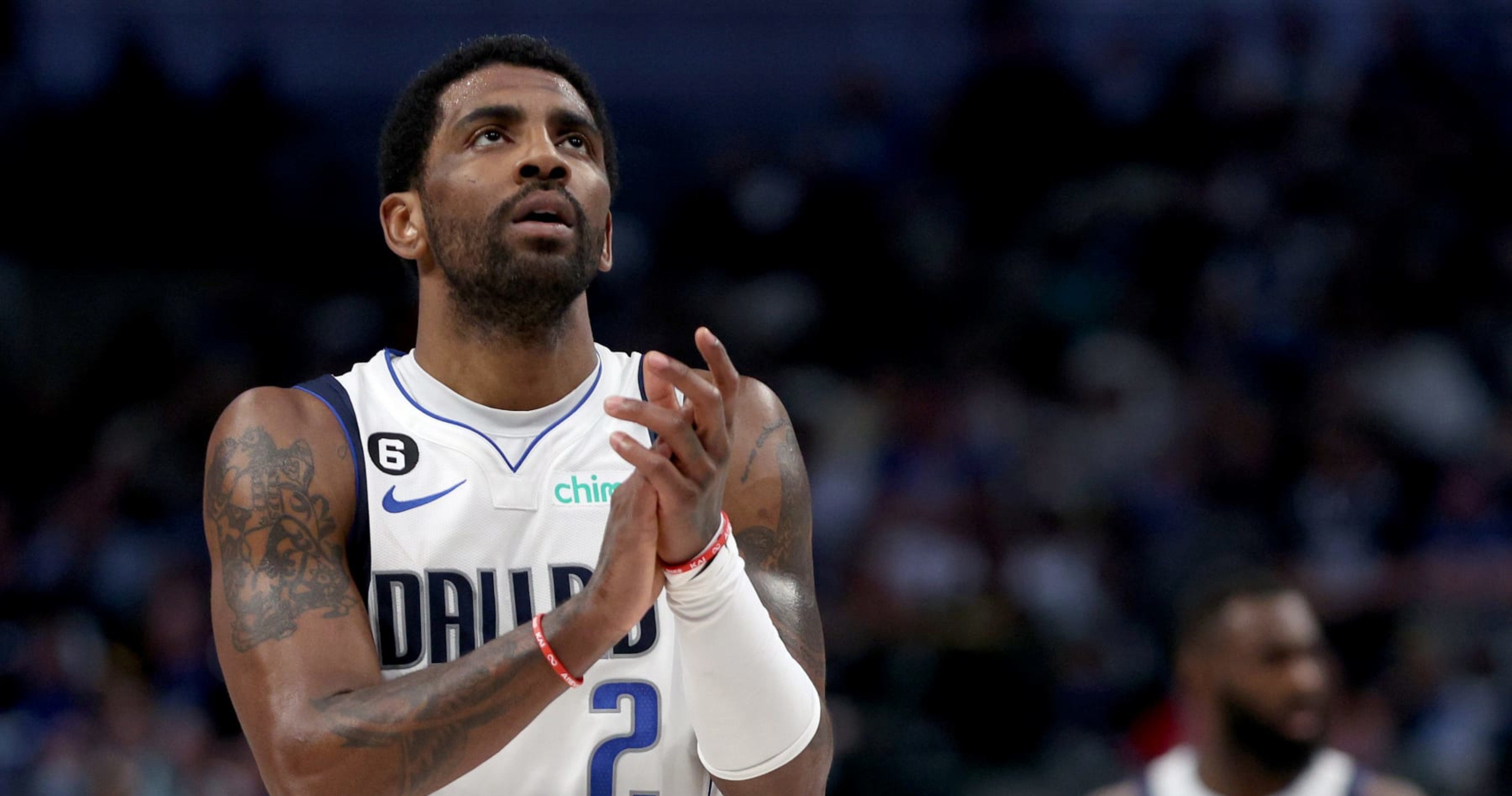 Mavs' Kyrie Irving Wears Walking Boot After Reaggravating Foot Injury ...