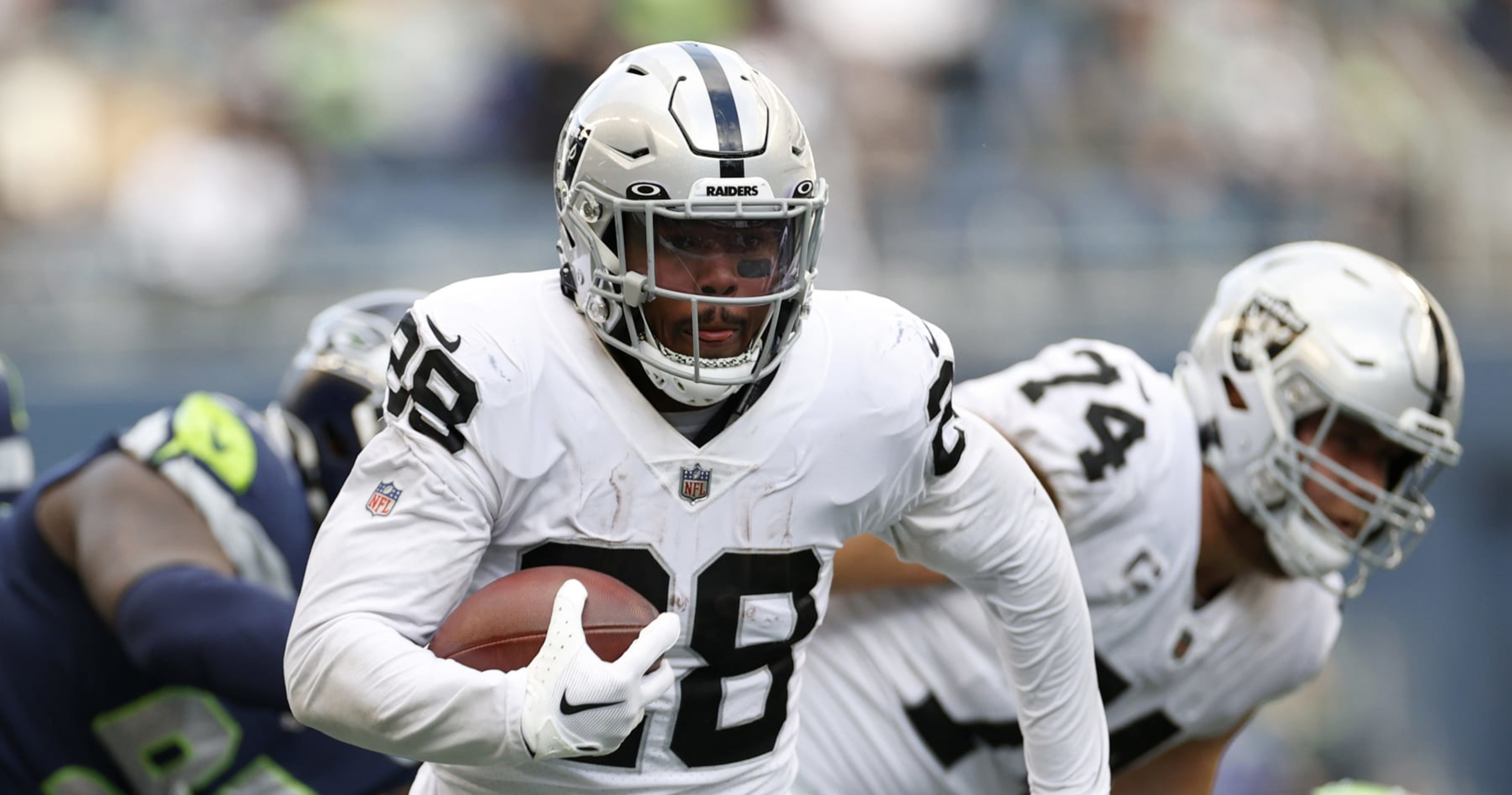 NFL Rumors Raiders 'Pretty Hopeful' Josh Jacobs Reports to Camp amid