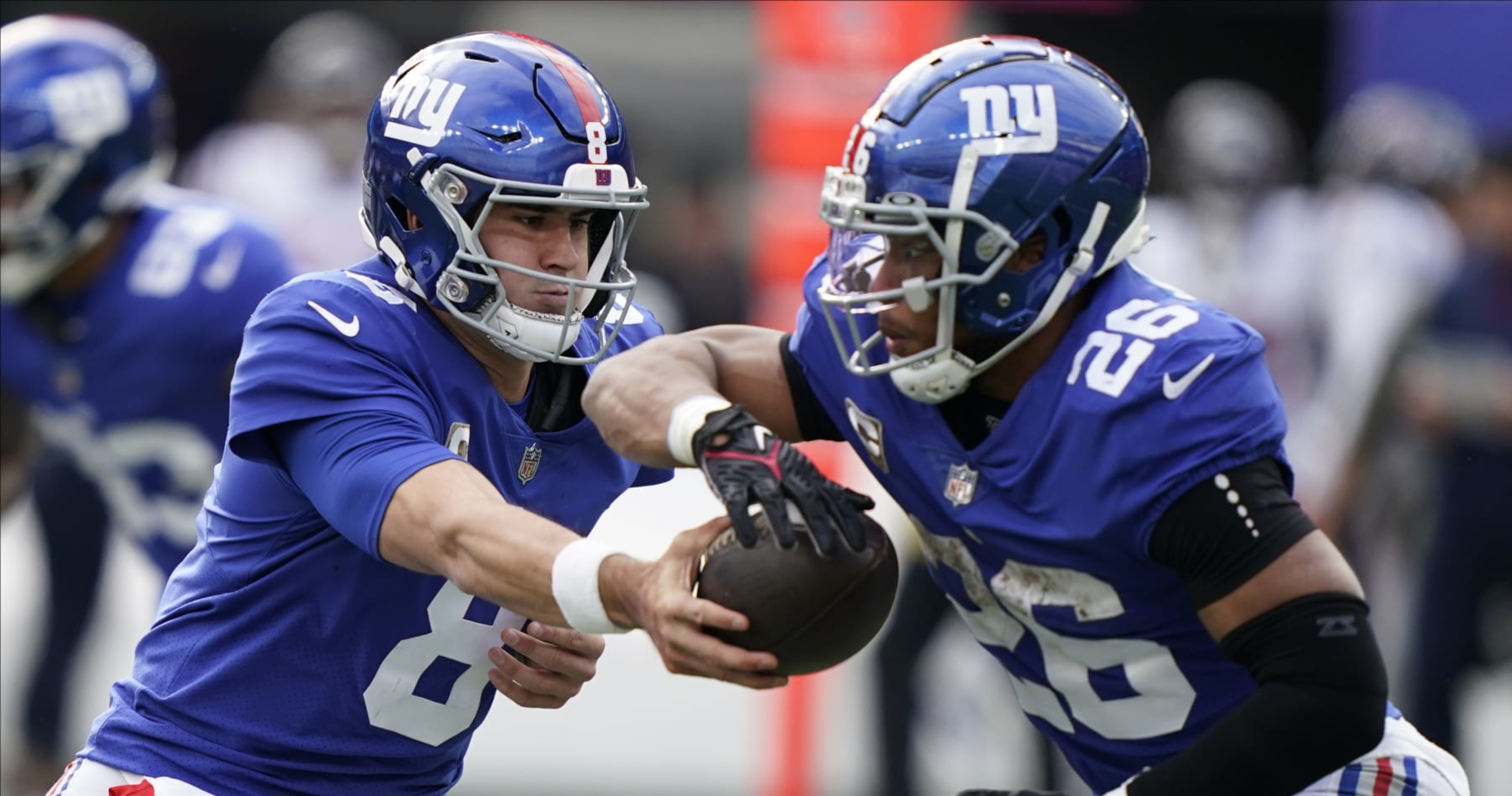 New York, USA. August 8, 2019, East Rutherford, New Jersey, USA: New York  Giants quarterback Daniel Jones (8) celebrates with running back Saquon  Barkley (26) after throwing his first touchdown pass during