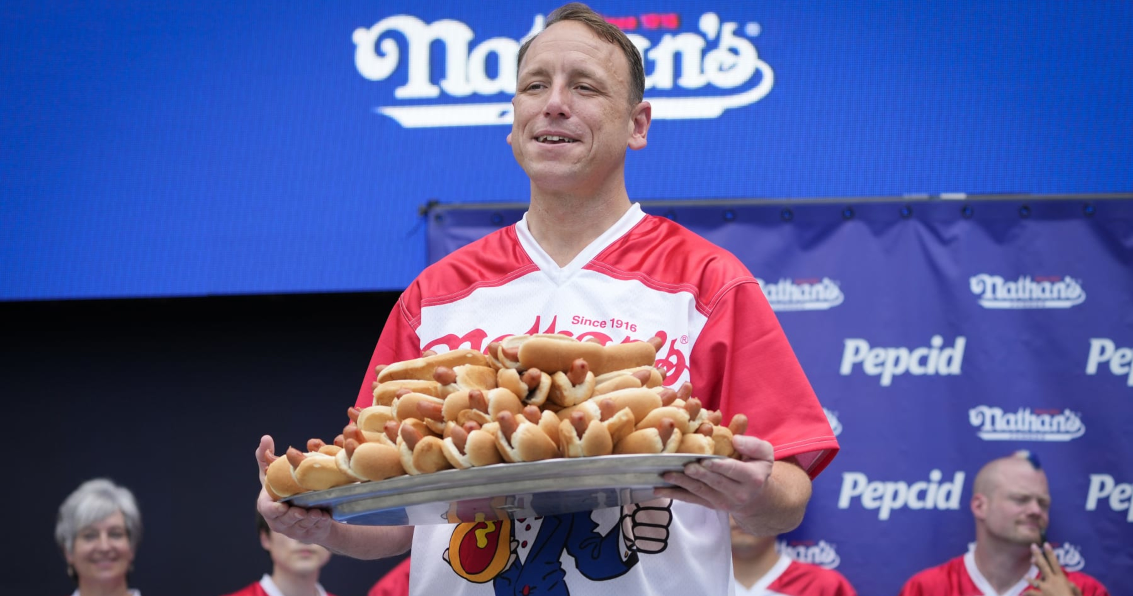 Joey Chestnut Hailed by Fans After Winning 2023 Nathan's Hot Dog Eating