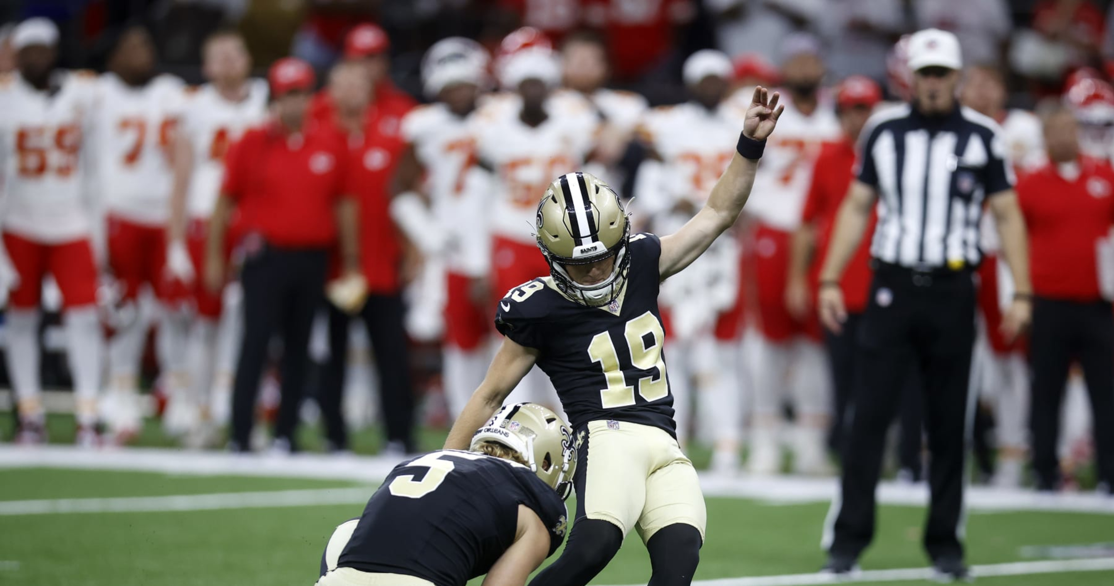 New Orleans Saints place kicker Blake Grupe (19) kicks a field