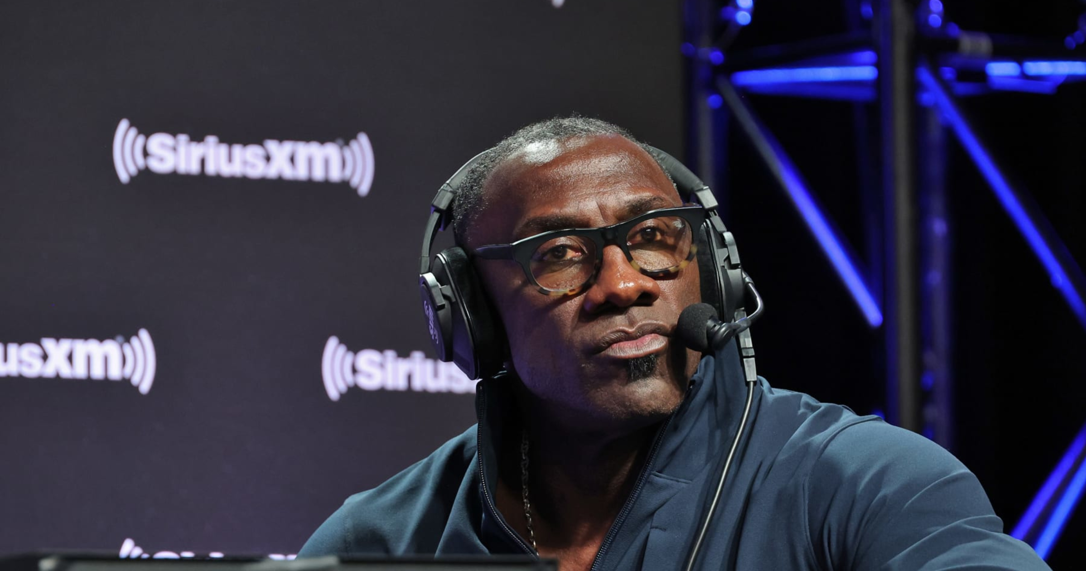 Shannon Sharpe of the Baltimore Ravens looks on from the sidelines News  Photo - Getty Images