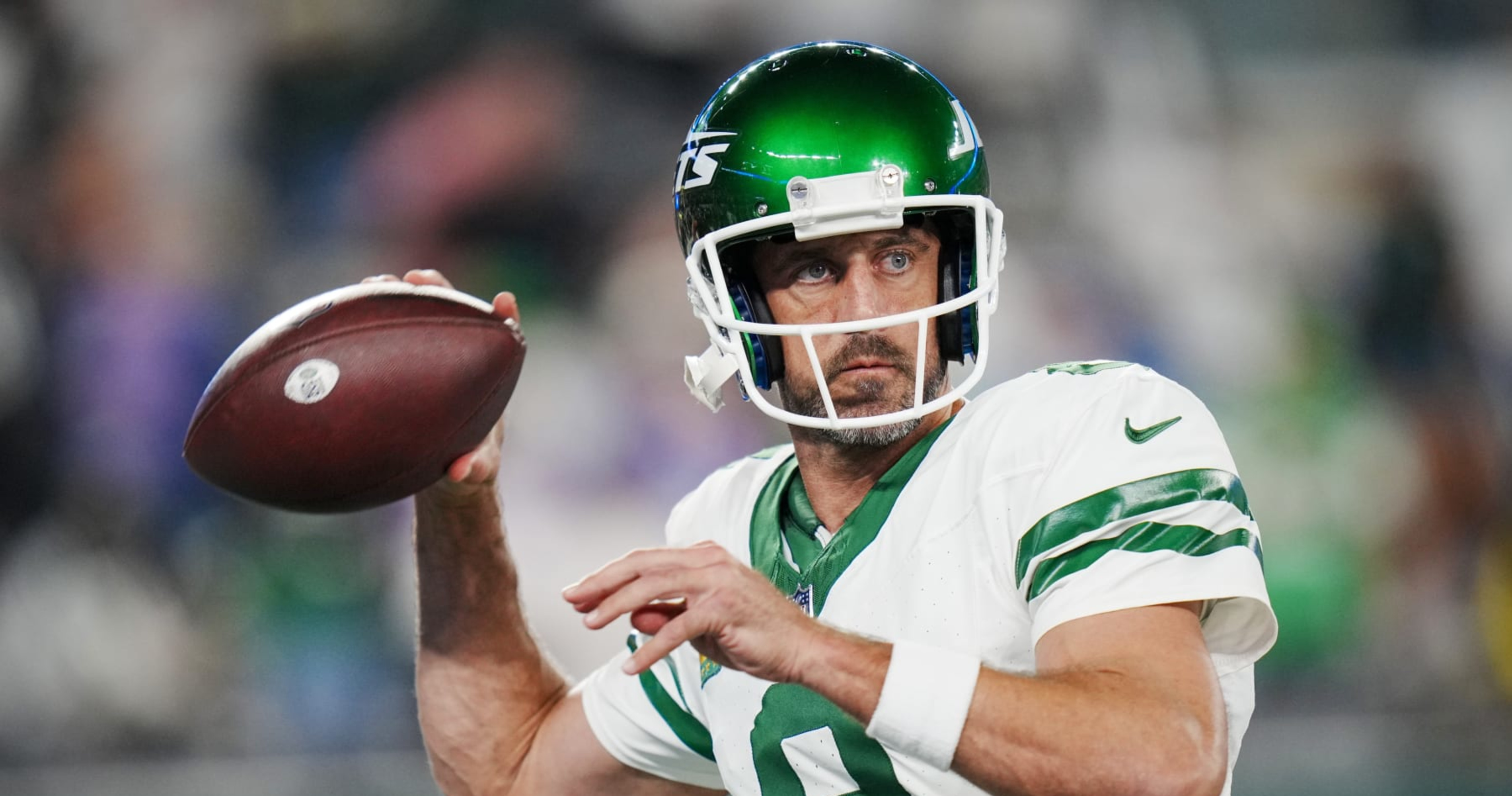 Aaron Rodgers injures his left Achilles tendon in his first series for the  Jets