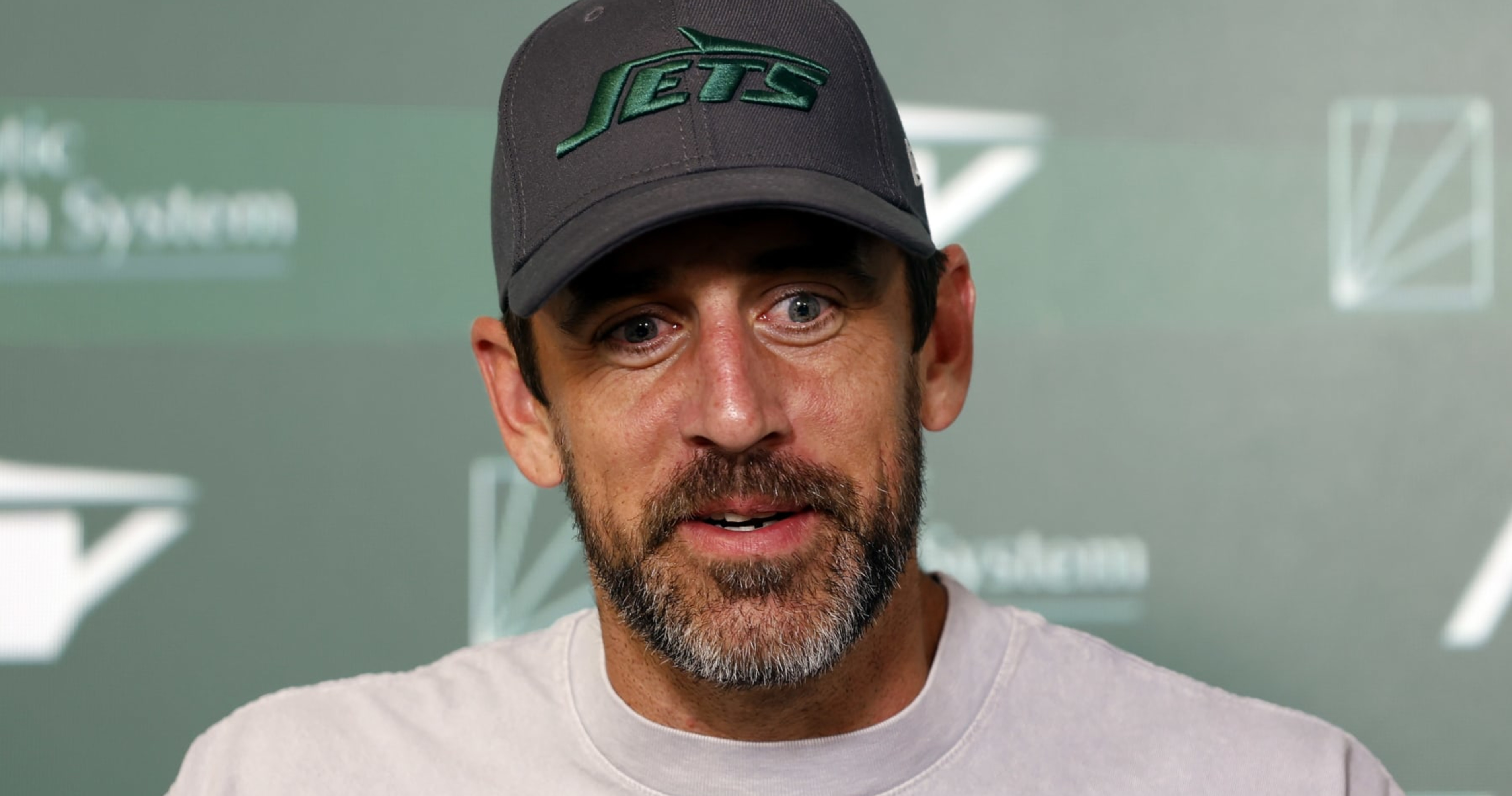Colin Cowherd Aaron Rodgers on Overseas Vacation amid Absence from