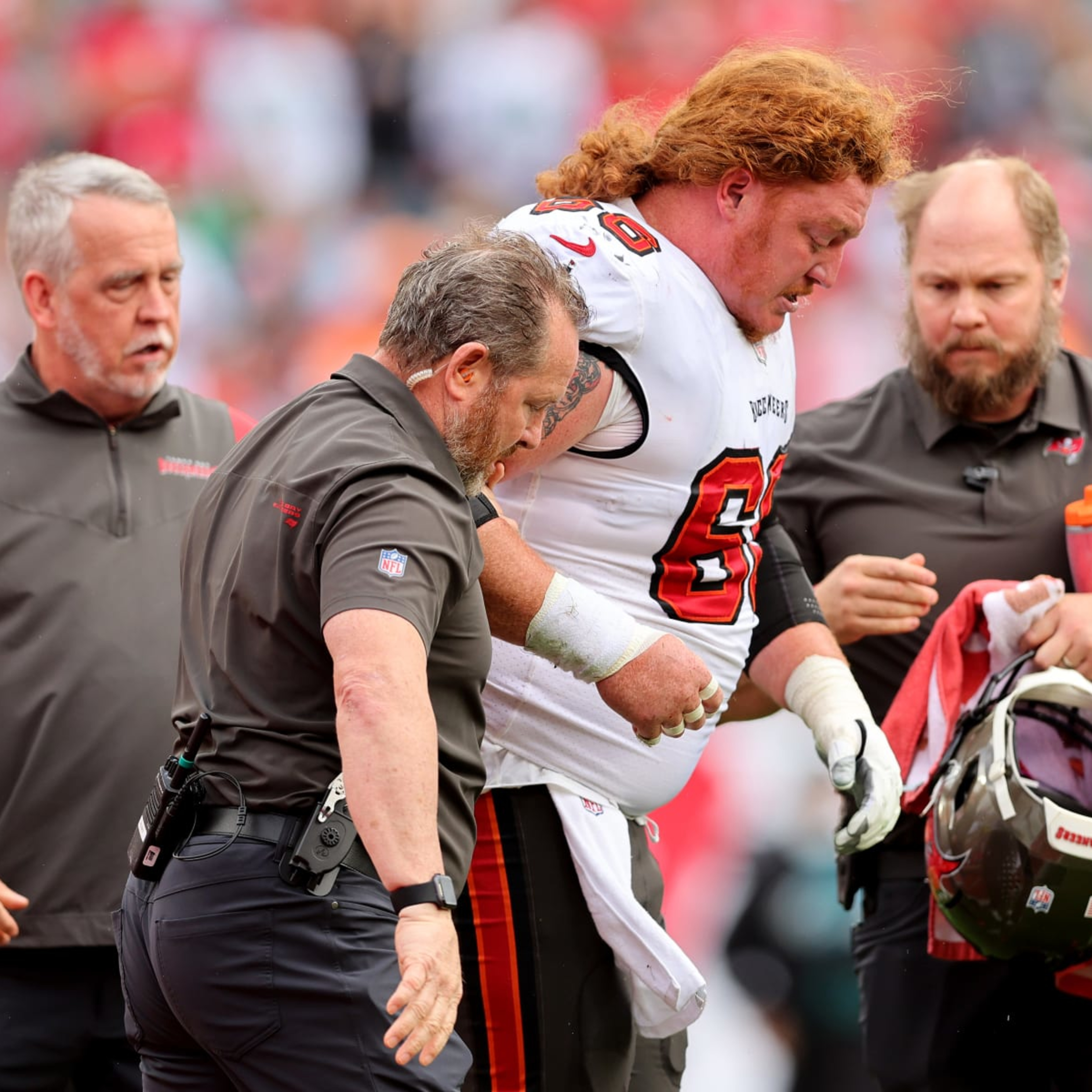 Bucs’ Pro Bowl Center Ryan Jensen Carted Off with Knee Injury at Training Camp