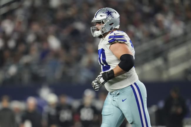 Dallas OL Zack Martin hurts calf, won't return vs Washington