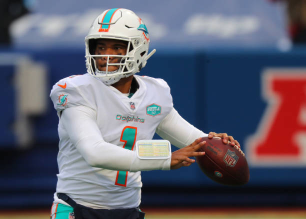 ORCHARD PARK, NY - JANUARY 03: Tua Tagovailoa #1 of the Miami Dolphins looks to throw a pass against the Buffalo Bills at Bills Stadium on January 3, 2021 in Orchard Park, New York. (Photo by Timothy T Ludwig/Getty Images)