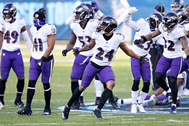 Report: Ravens' Marcus Peters fined for dramatic celebration on Titans logo