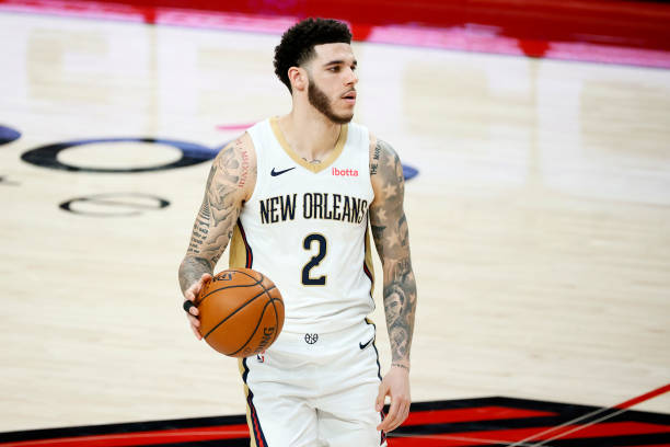 PORTLAND, OREGON - MARCH 18: Lonzo Ball #2 of the New Orleans Pelicans in action against the Portland Trail Blazers during the first quarter at Moda Center on March 18, 2021 in Portland, Oregon. NOTE TO USER: User expressly acknowledges and agrees that, by downloading and or using this photograph, User is consenting to the terms and conditions of the Getty Images License Agreement. (Photo by Steph Chambers/Getty Images)