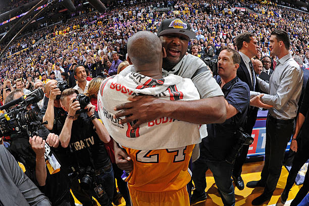 LOS ANGELES, CA - APRIL 13:  Former NBA player, Lamar Odom hugs Kobe Bryant #24 of the Los Angeles Lakers after the game against the Utah Jazz on April 13, 2016 at Staples Center in Los Angeles, California. NOTE TO USER: User expressly acknowledges and agrees that, by downloading and/or using this Photograph, user is consenting to the terms and conditions of the Getty Images License Agreement. Mandatory Copyright Notice: Copyright 2016 NBAE (Photo by Andrew D. Bernstein/NBAE via Getty Images)
