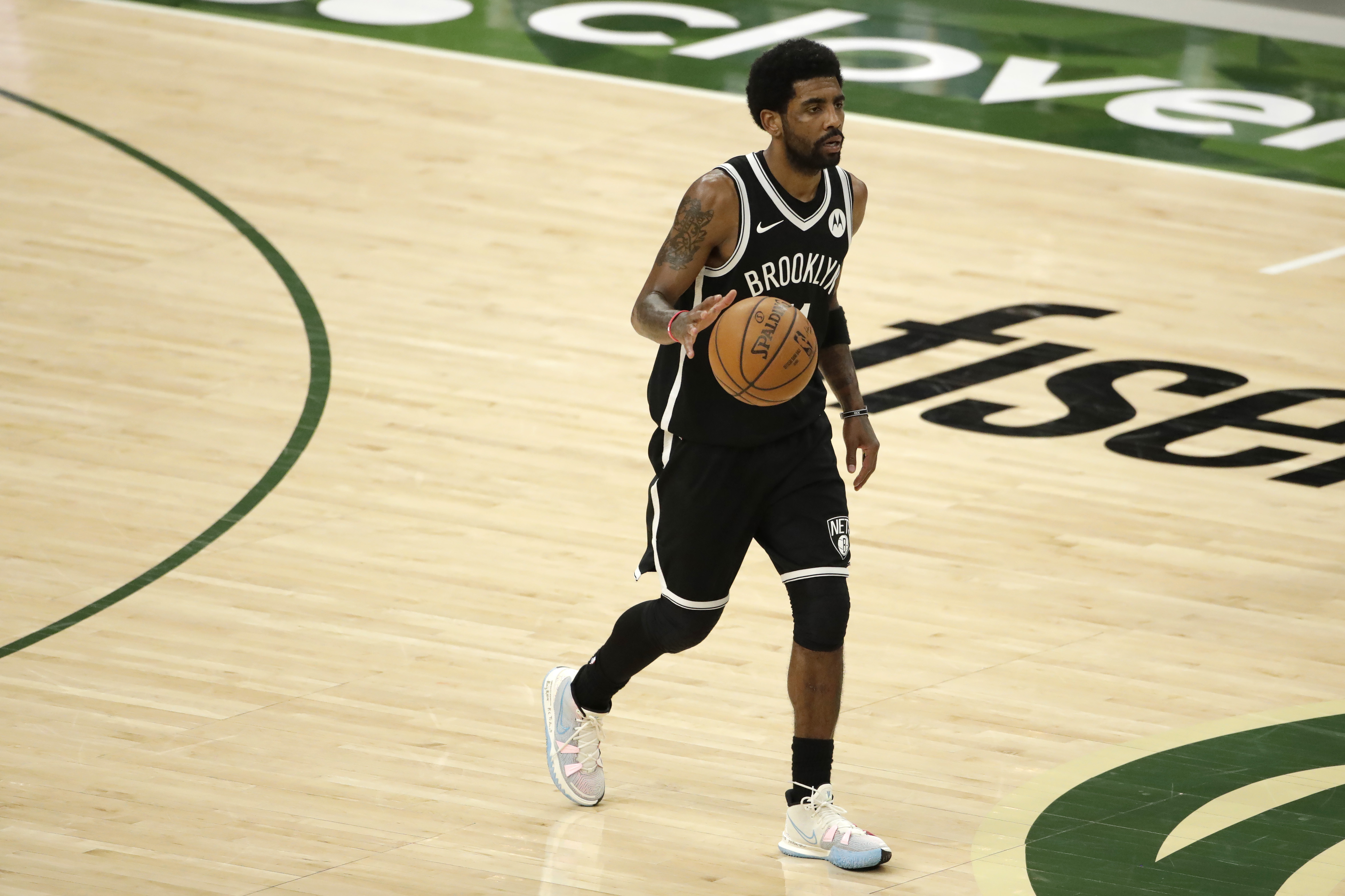 Kyrie Irving, Brooklyn Nets fined for violating league media access rules