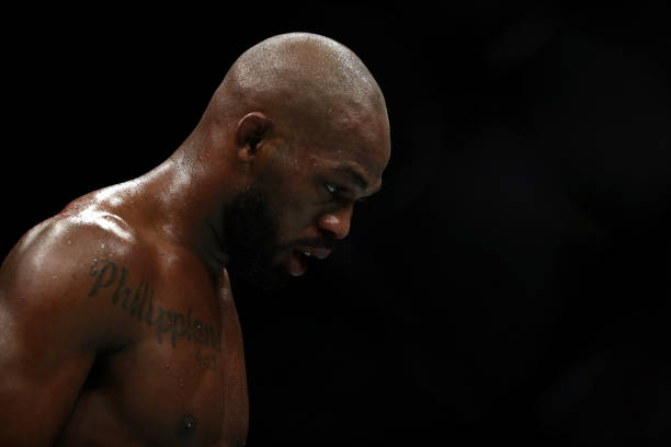 HOUSTON, TEXAS - FEBRUARY 08:  Jon Jones walks to his corner in between rounds against Dominick Reyes in their UFC Light Heavyweight Championship bout during UFC 247 at Toyota Center on February 08, 2020 in Houston, Texas. (Photo by Ronald Martinez/Getty Images)