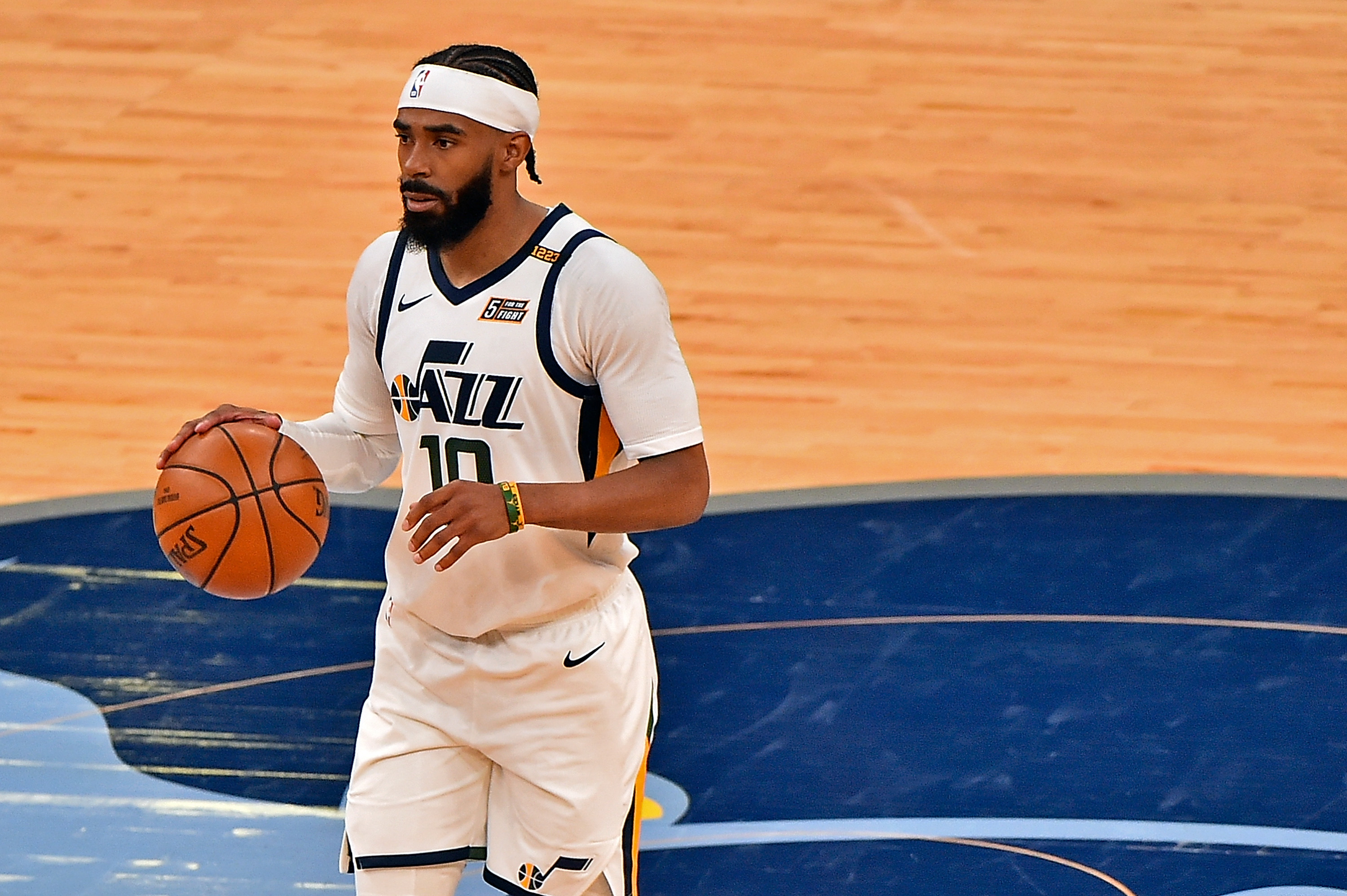 MEMPHIS, TENNESSEE - MAY 31: Mike Conley #10 of the Utah Jazz brings the ball up court against the Memphis Grizzlies during Game Four of the Western Conference first round series on May 31, 2021 at FedExForum in Memphis, Tennessee. NOTE TO USER: User expressly acknowledges and agrees that, by downloading and or using this photograph, User is consenting to the terms and conditions of the Getty Images License Agreement. (Photo by Justin Ford/Getty Images) (Photo by Justin Ford/Getty Images)