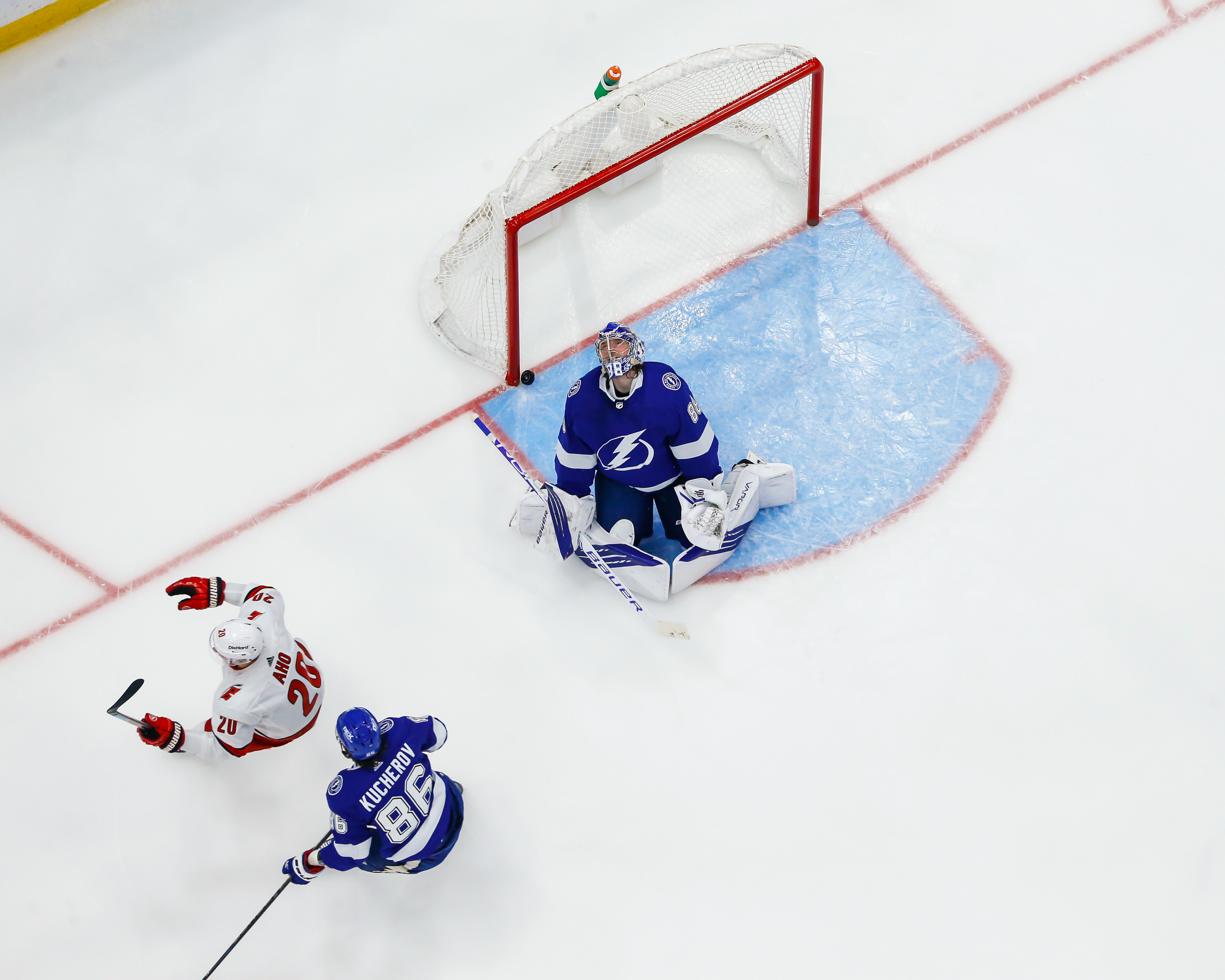 TAMPA, FL - June 3: Goalie Andrei Vasilevskiy #88 of the Tampa Bay Lightning gives up a goal against Sebastian Aho #20 of the Carolina Hurricanes during the second period in Game Three of the Second Round of the 2021 Stanley Cup Playoffs at Amalie Arena on June 3, 2021 in Tampa, Florida. (Photo by Mark LoMoglio/NHLI via Getty Images)