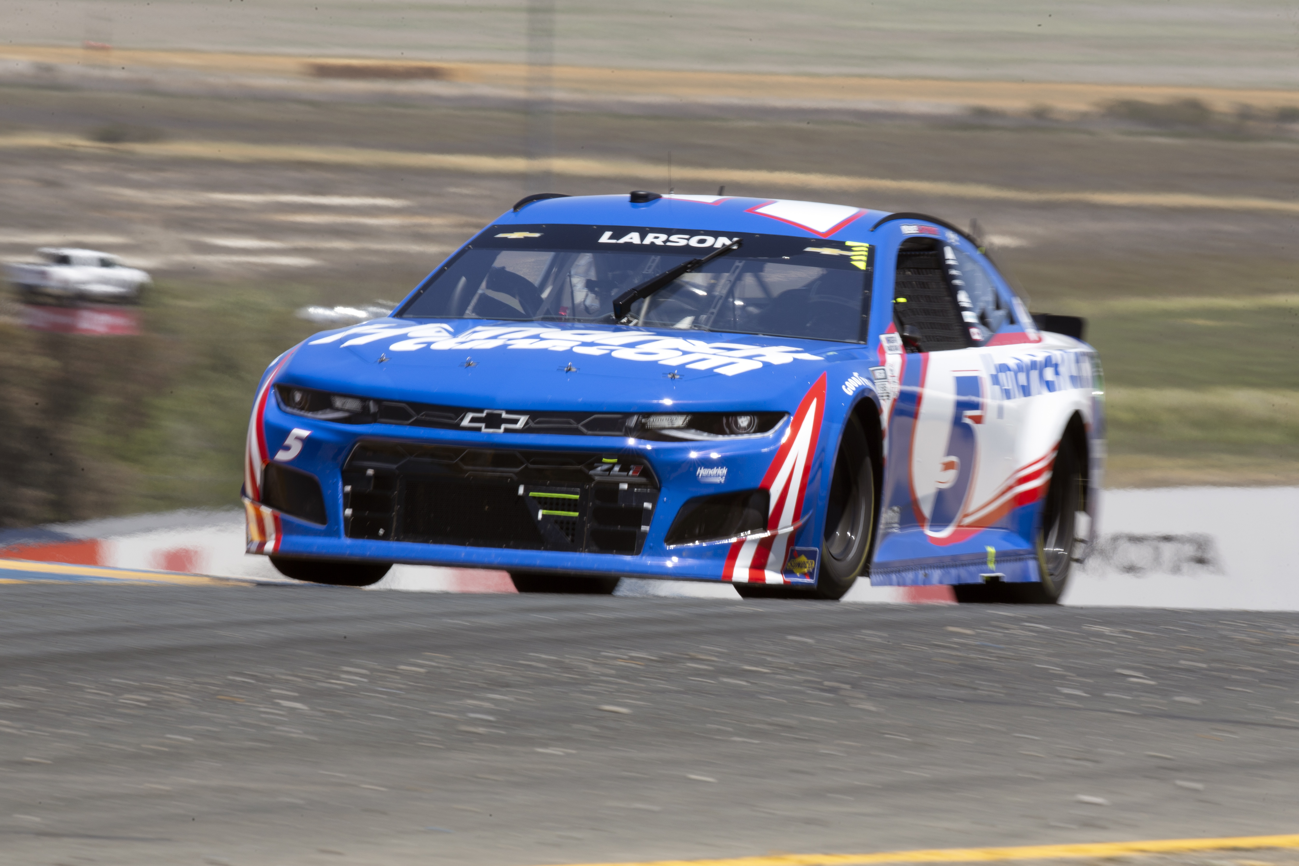 Kyle Larson speeds through turn 2 during a NASCAR Cup Series race, Sunday, June 6, 2021, at Sonoma Raceway in Sonoma, Calif. Larson won the first and second stages of the 350-mile race. (AP Photo/D. Ross Cameron)