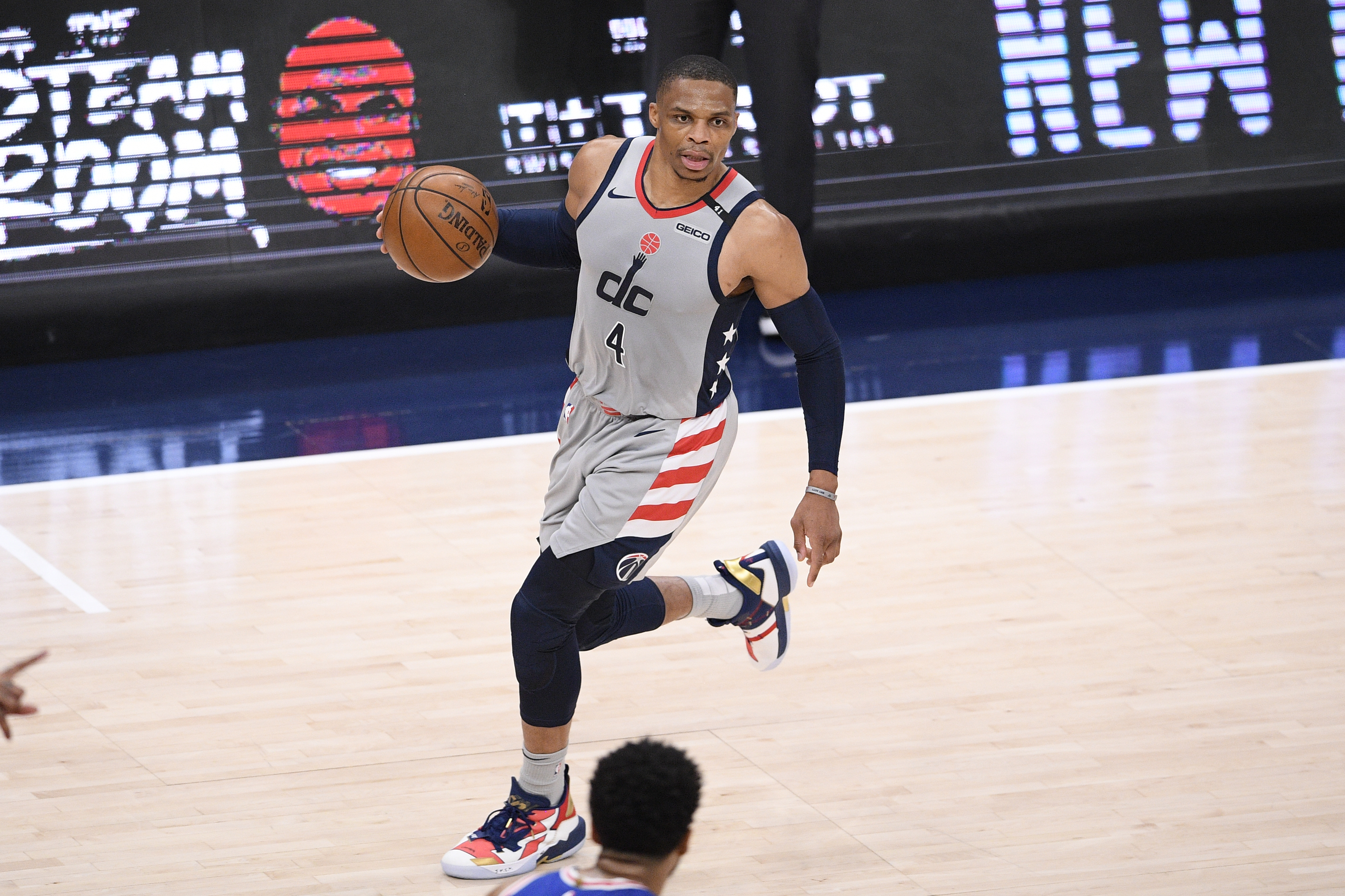 Washington Wizards guard Russell Westbrook (4) dribbles the ball during the first half of Game 4 in a first-round NBA basketball playoff series against the Philadelphia 76ers, Monday, May 31, 2021, in Washington. (AP Photo/Nick Wass)