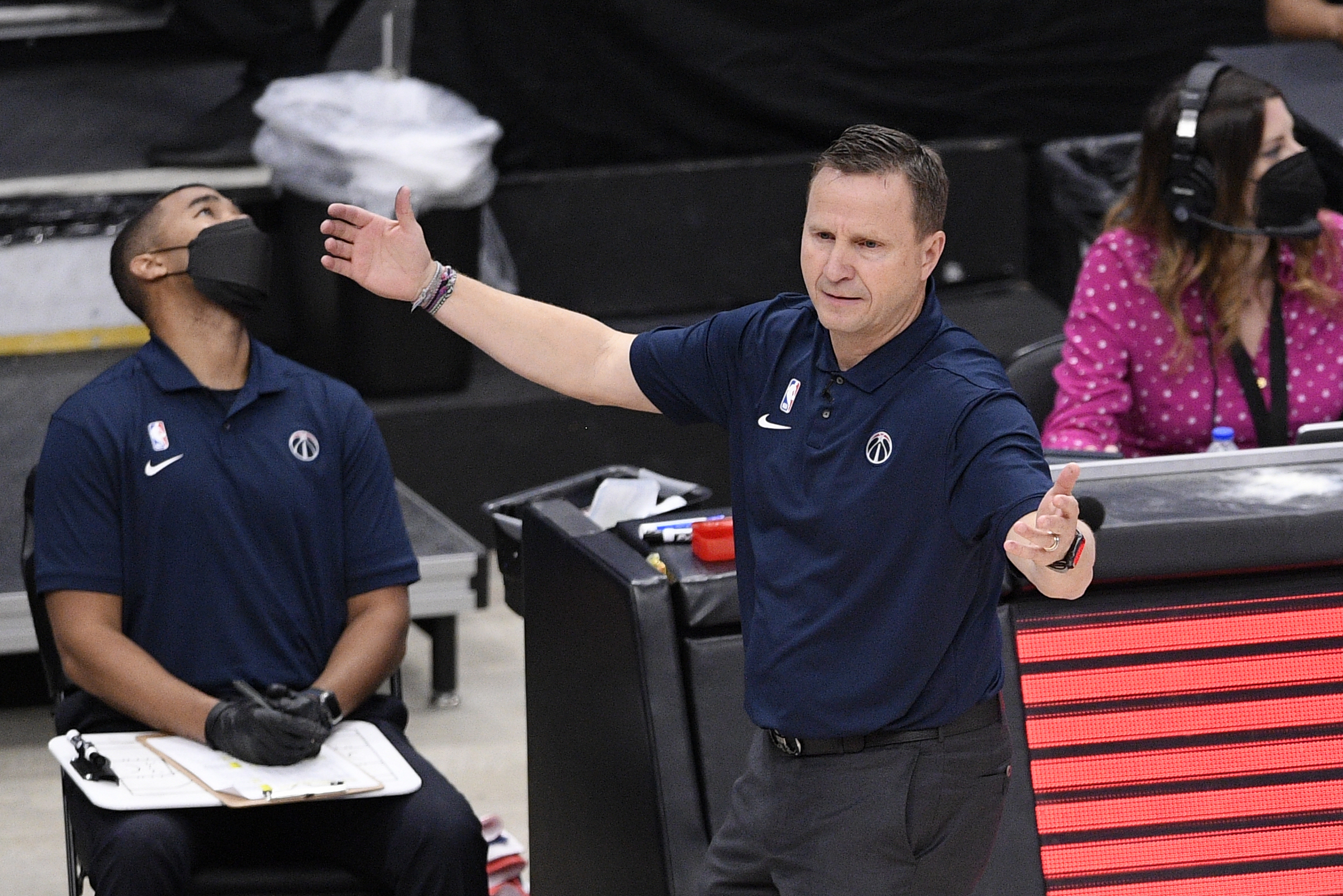 Washington Wizards head coach Scott Brooks gestures during the second half of Game 4 in a first-round NBA basketball playoff series against the Philadelphia 76ers, Monday, May 31, 2021, in Washington. (AP Photo/Nick Wass)