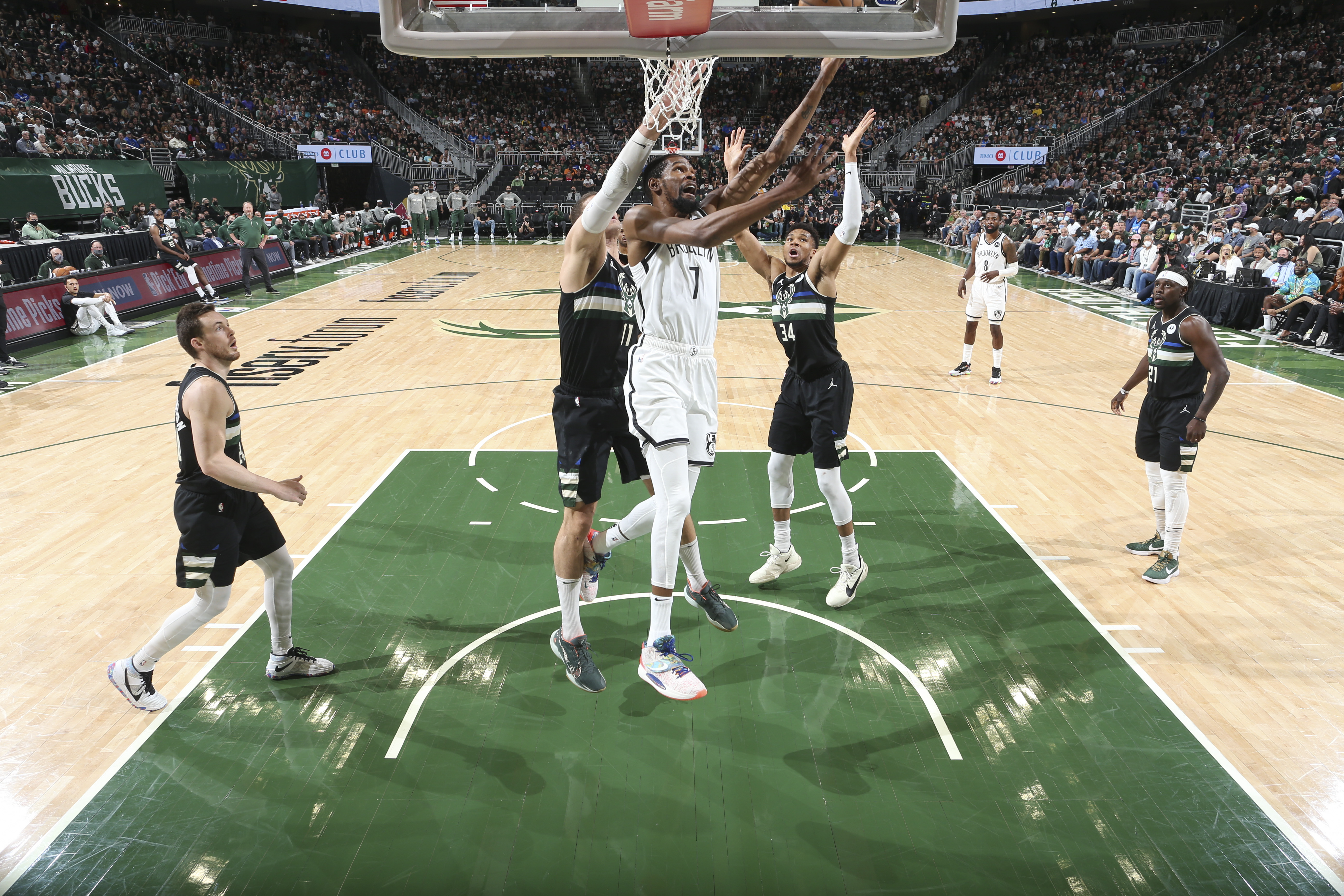 MILWAUKEE, WI - JUNE 17: Kevin Durant #7 of the Brooklyn Nets drives to the basket during the game against the Milwaukee Bucks during Round 2, Game 6 of the 2021 NBA Playoffs on June 17, 2021 at the Fiserv Forum Center in Milwaukee, Wisconsin. NOTE TO USER: User expressly acknowledges and agrees that, by downloading and or using this Photograph, user is consenting to the terms and conditions of the Getty Images License Agreement. Mandatory Copyright Notice: Copyright 2021 NBAE (Photo by Nathaniel S. Butler/NBAE via Getty Images).