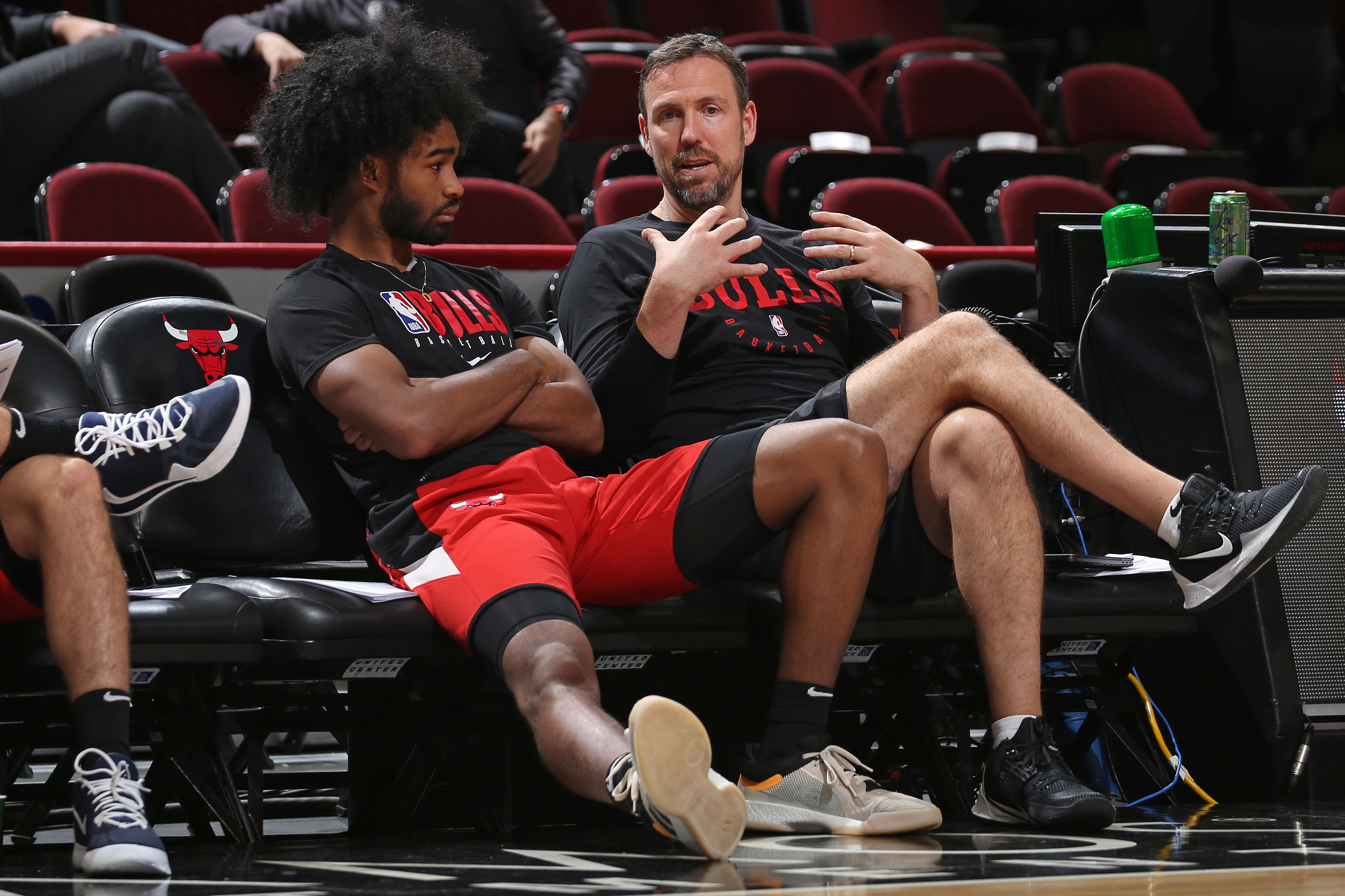 CHICAGO, IL -  NOVEMBER 16: Coby White #0 talks with assistant coach Chris Fleming of the Chicago Bulls before the game on November 16, 2019 at United Center in Chicago, Illinois. NOTE TO USER: User expressly acknowledges and agrees that, by downloading and or using this Photograph, user is consenting to the terms and conditions of the Getty Images License Agreement. Mandatory Copyright Notice: Copyright 2019 NBAE (Photo by Gary Dineen/NBAE via Getty Images)