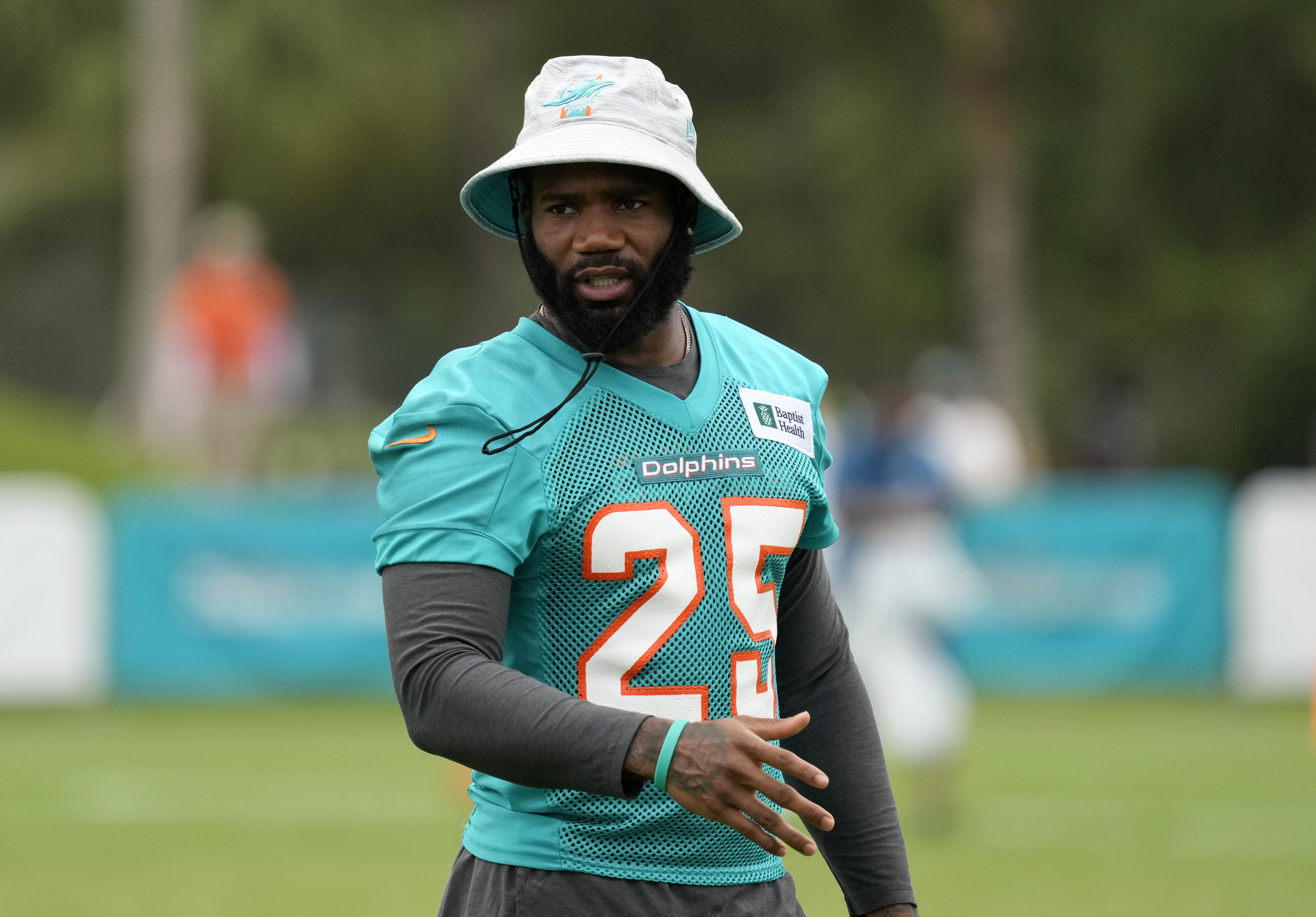 MIAMI GARDENS, FLORIDA - AUGUST 03: Cornerback Xavien Howard #25 of the Miami Dolphins attends, but does not participate in practice drills during Training Camp at Baptist Health Training Complex on August 03, 2021 in Miami Gardens, Florida. Howard is being held out of practice for precautionary reasons, as ongoing contract discussions with the team continue. (Photo by Mark Brown/Getty Images)