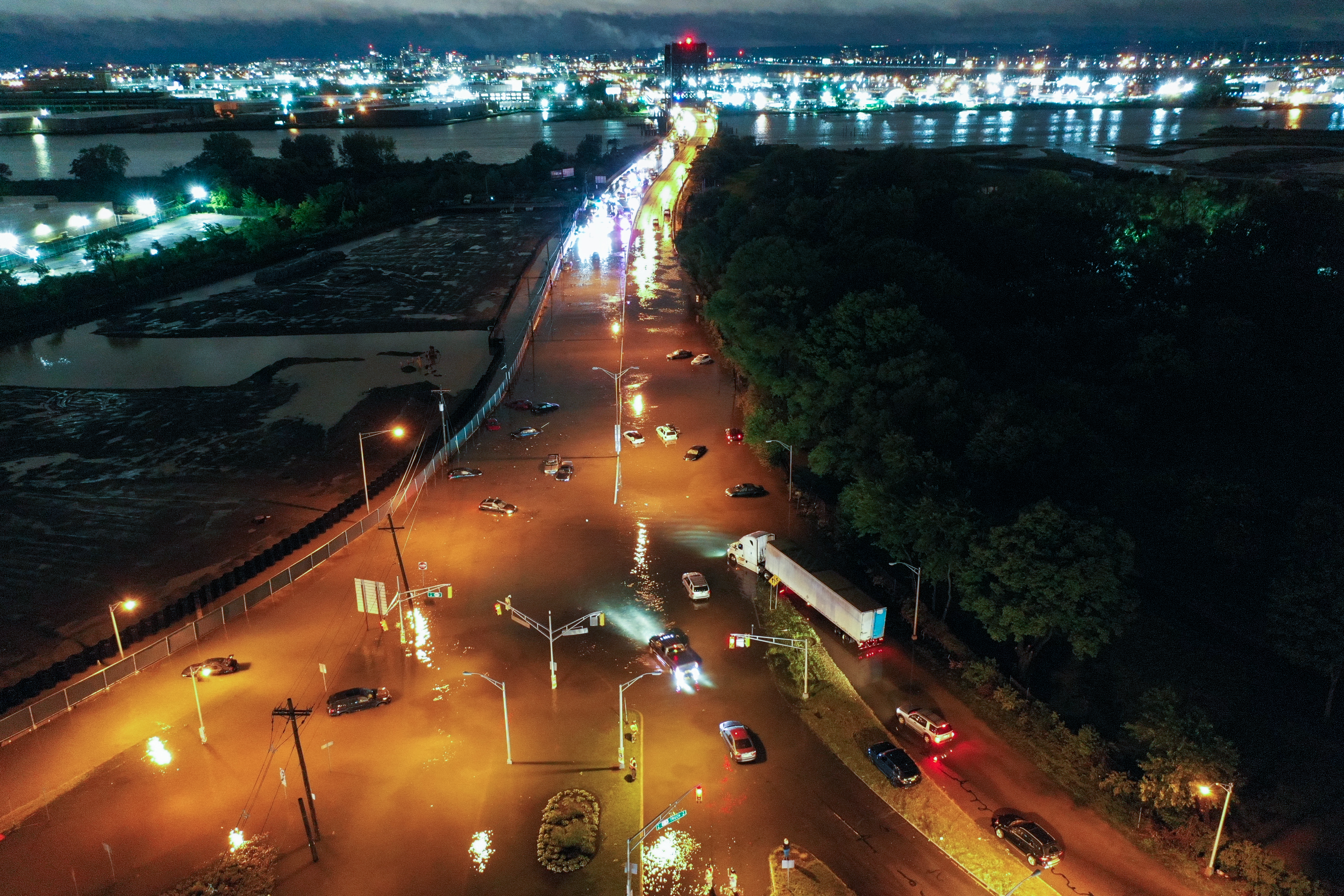 NEW JERSEY, USA - SEPTEMBER 2: Highway 440 flooded in Jersey City of New Jersey, United States on September 2, 2021 as hundreds of cars stuck in water as Hurricane Ida left behind flash floods east coast. (Photo by Tayfun Coskun/Anadolu Agency via Getty Images)