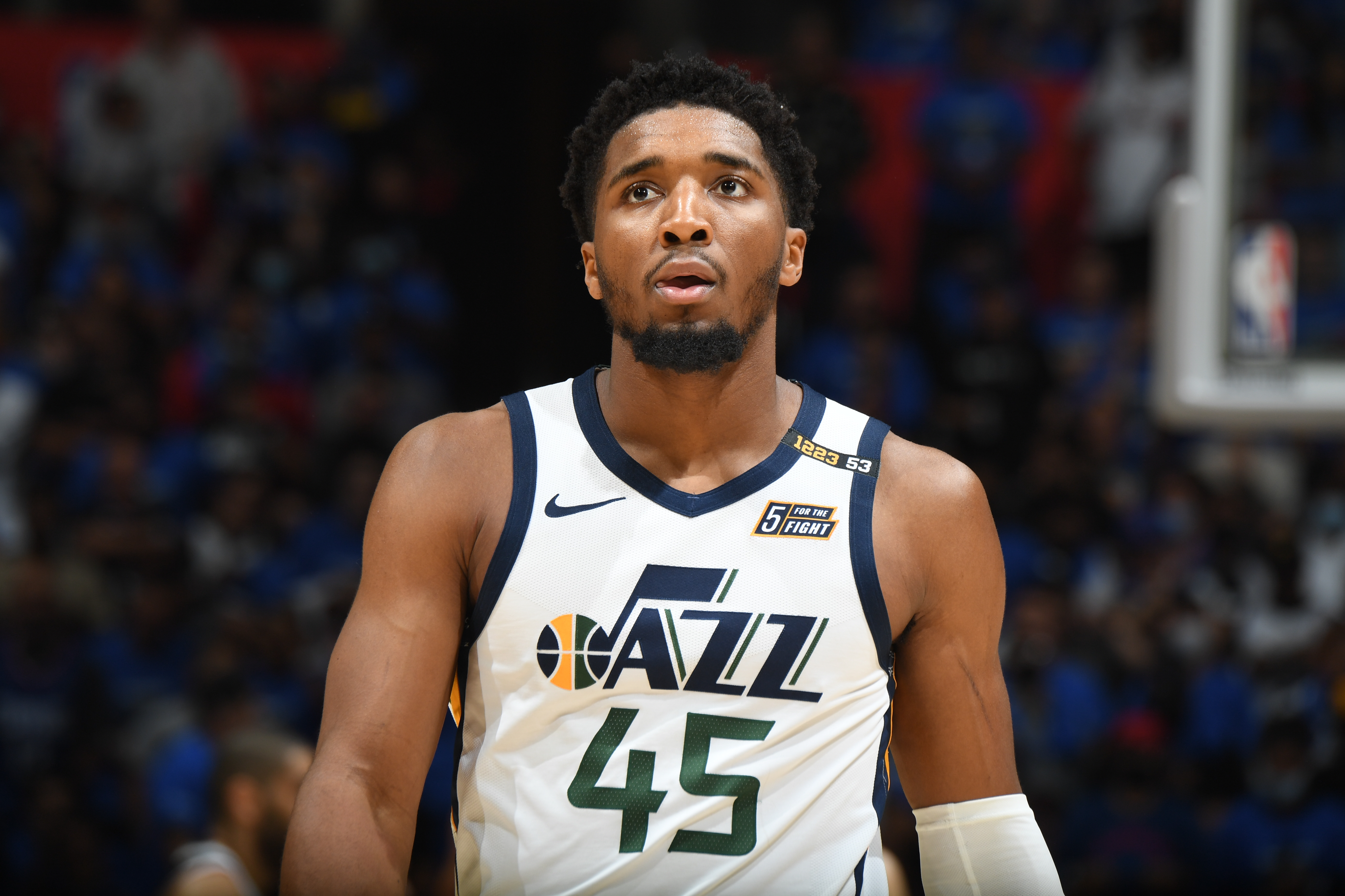LOS ANGELES, CA - JUNE 18: Donovan Mitchell #45 of the Utah Jazz looks on during the game against the LA Clippers during Round 2, Game 6 of the 2021 NBA Playoffs on June 18, 2021 at STAPLES Center in Los Angeles, California. NOTE TO USER: User expressly acknowledges and agrees that, by downloading and/or using this Photograph, user is consenting to the terms and conditions of the Getty Images License Agreement. Mandatory Copyright Notice: Copyright 2021 NBAE (Photo by Andrew D. Bernstein/NBAE via Getty Images)