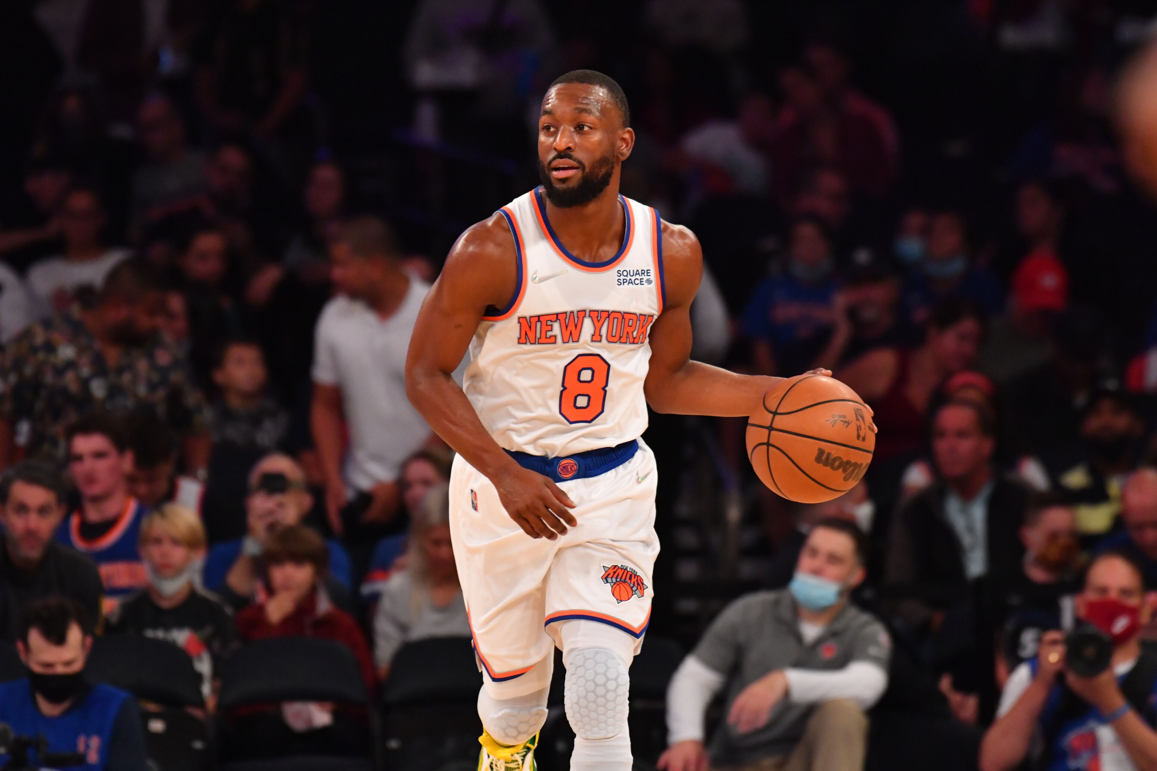 NEW YORK, NY - OCTOBER 15: Kemba Walker #8 of the New York Knicks handles the ball against the Washington Wizards during a preseason game on October 15, 2021 at Madison Square Garden in New York, New York. NOTE TO USER: User expressly acknowledges and agrees that, by downloading and/or using this Photograph, user is consenting to the terms and conditions of the Getty Images License Agreement. Mandatory Copyright Notice: Copyright 2021 NBAE (Photo by Jesse D. Garrabrant/NBAE via Getty Images)