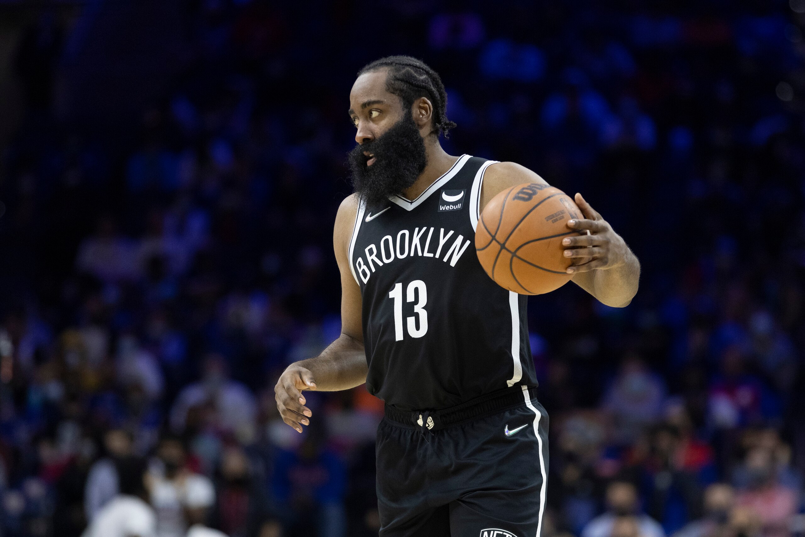 PHILADELPHIA, PA - OCTOBER 11: James Harden #13 of the Brooklyn Nets dribbles the ball against the Philadelphia 76ers at the Wells Fargo Center on October 11, 2021 in Philadelphia, Pennsylvania. NOTE TO USER: User expressly acknowledges and agrees that, by downloading and or using this photograph, User is consenting to the terms and conditions of the Getty Images License Agreement. (Photo by Mitchell Leff/Getty Images)
