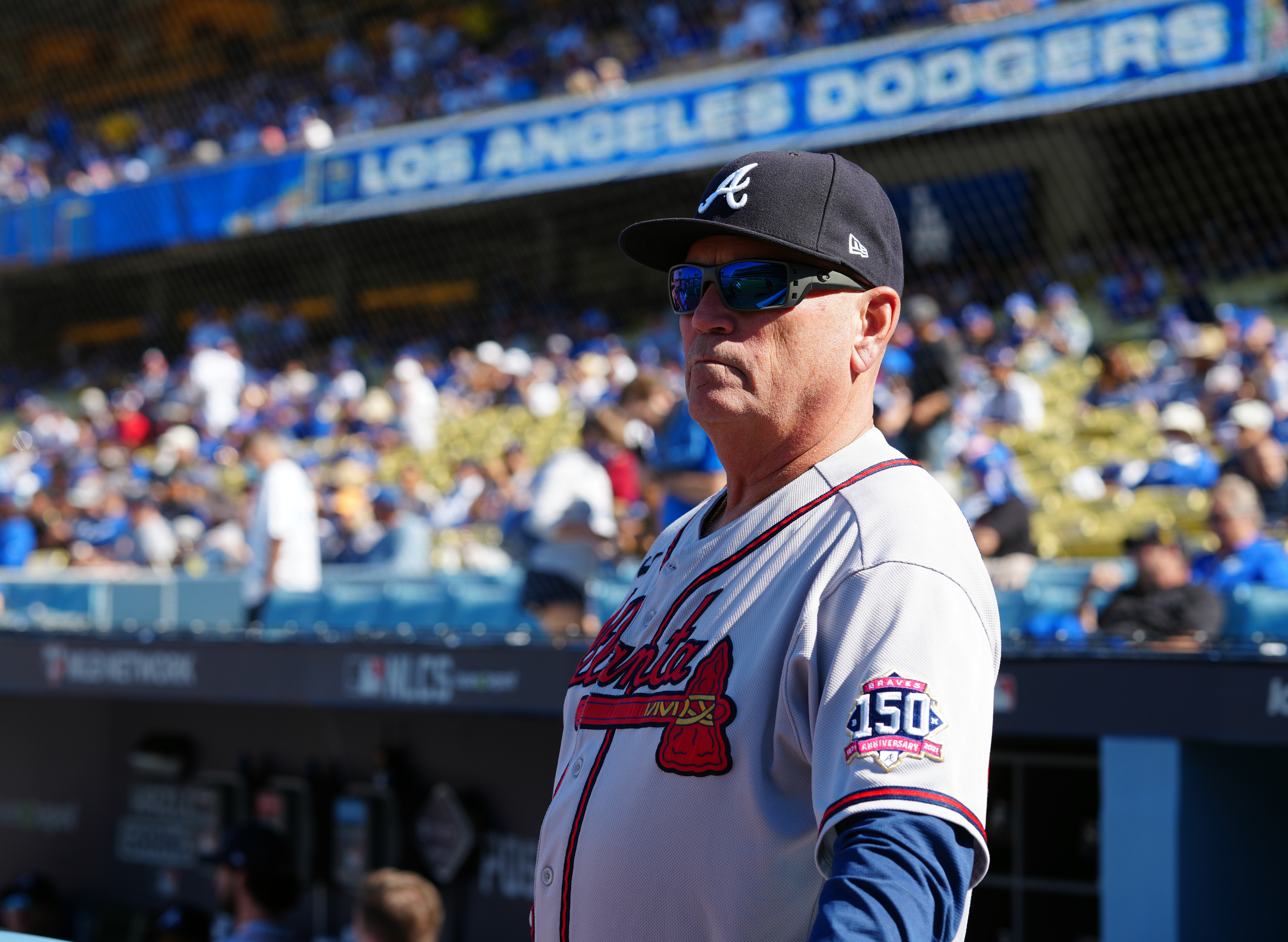LOS ANGELES, CA - OCTOBER 19: Atlanta Braves manager Brian Snitker #43 is seen in the dugout before Game 3 of the NLCS between the Atlanta Braves and the Los Angeles Dodgers at Dodgers Stadium on Tuesday, October 19, 2021 in Los Angeles, California. (Photo by Daniel Shirey/MLB Photos via Getty Images)