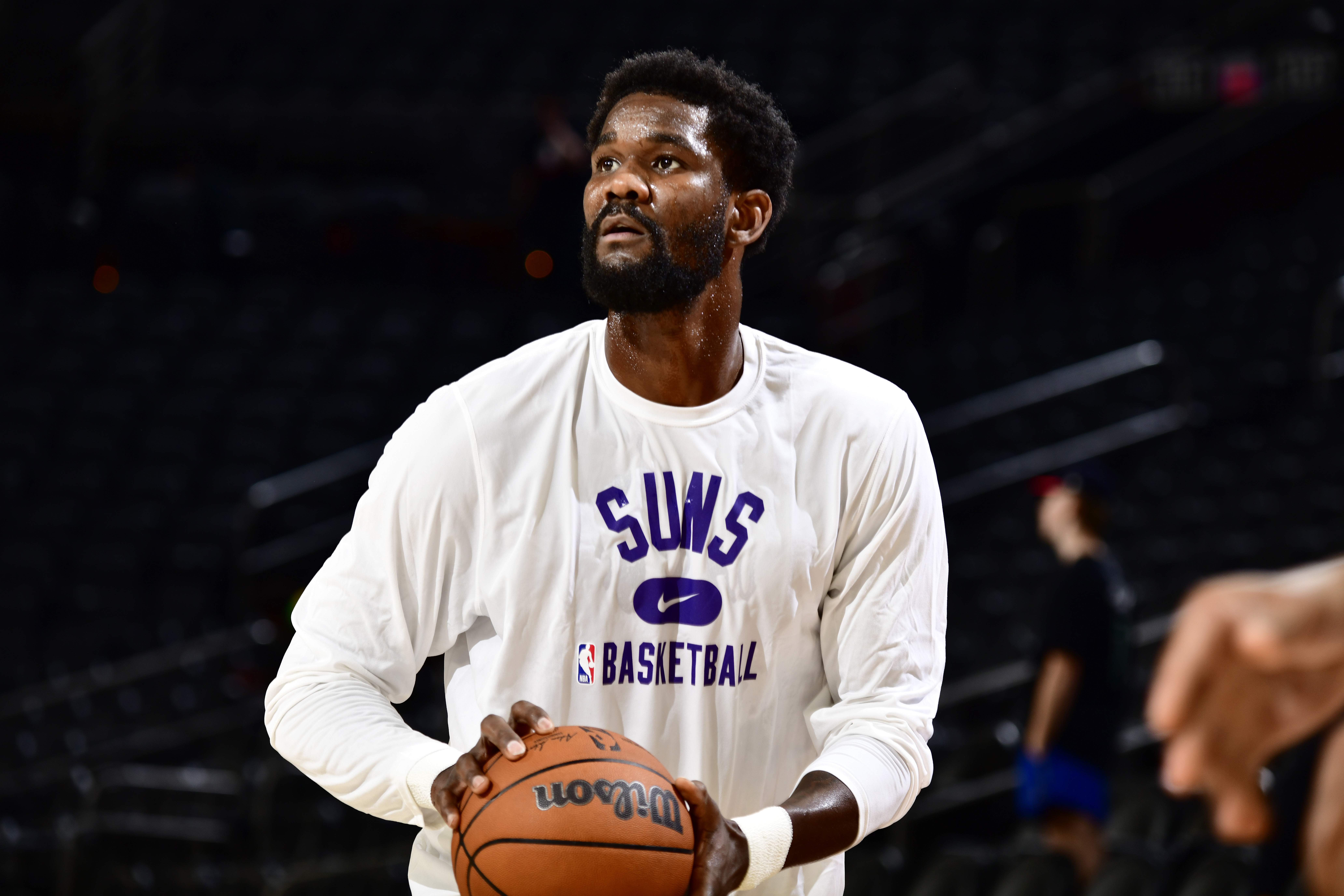PHOENIX, AZ - OCTOBER 6:  Deandre Ayton #22 of the Phoenix Suns handles the ball before the game against the Los Angeles Lakers during a preseason game on October 6, 2021 at Footprint Center in Phoenix, Arizona. NOTE TO USER: User expressly acknowledges and agrees that, by downloading and or using this photograph, user is consenting to the terms and conditions of the Getty Images License Agreement. Mandatory Copyright Notice: Copyright 2021 NBAE (Photo by Barry Gossage/NBAE via Getty Images)