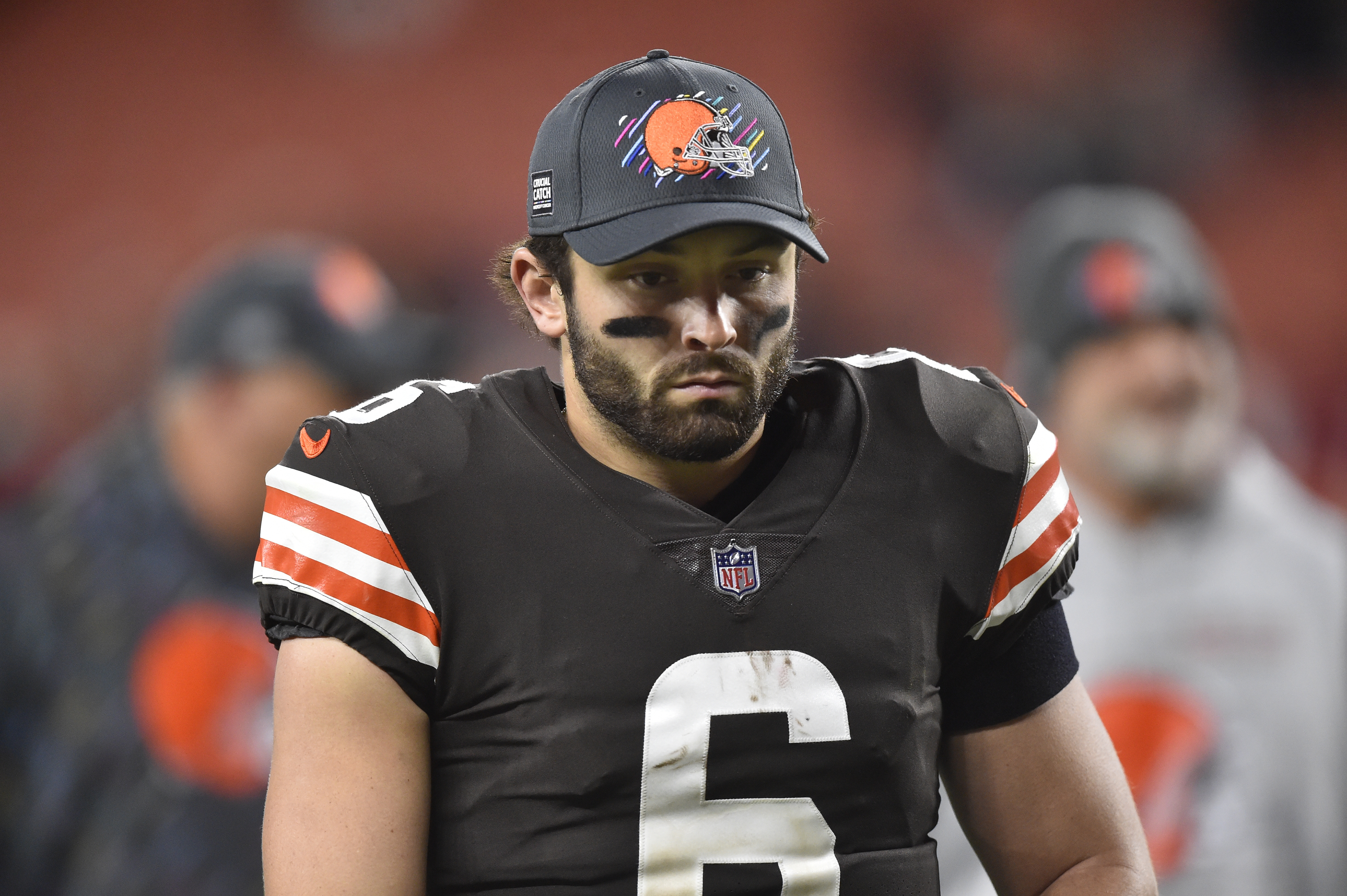 Cleveland Browns quarterback Baker Mayfield walks off the field after an NFL football game against the Arizona Cardinals, Sunday, Oct. 17, 2021, in Cleveland. The Cardinals won 37-14. (AP Photo/David Richard)