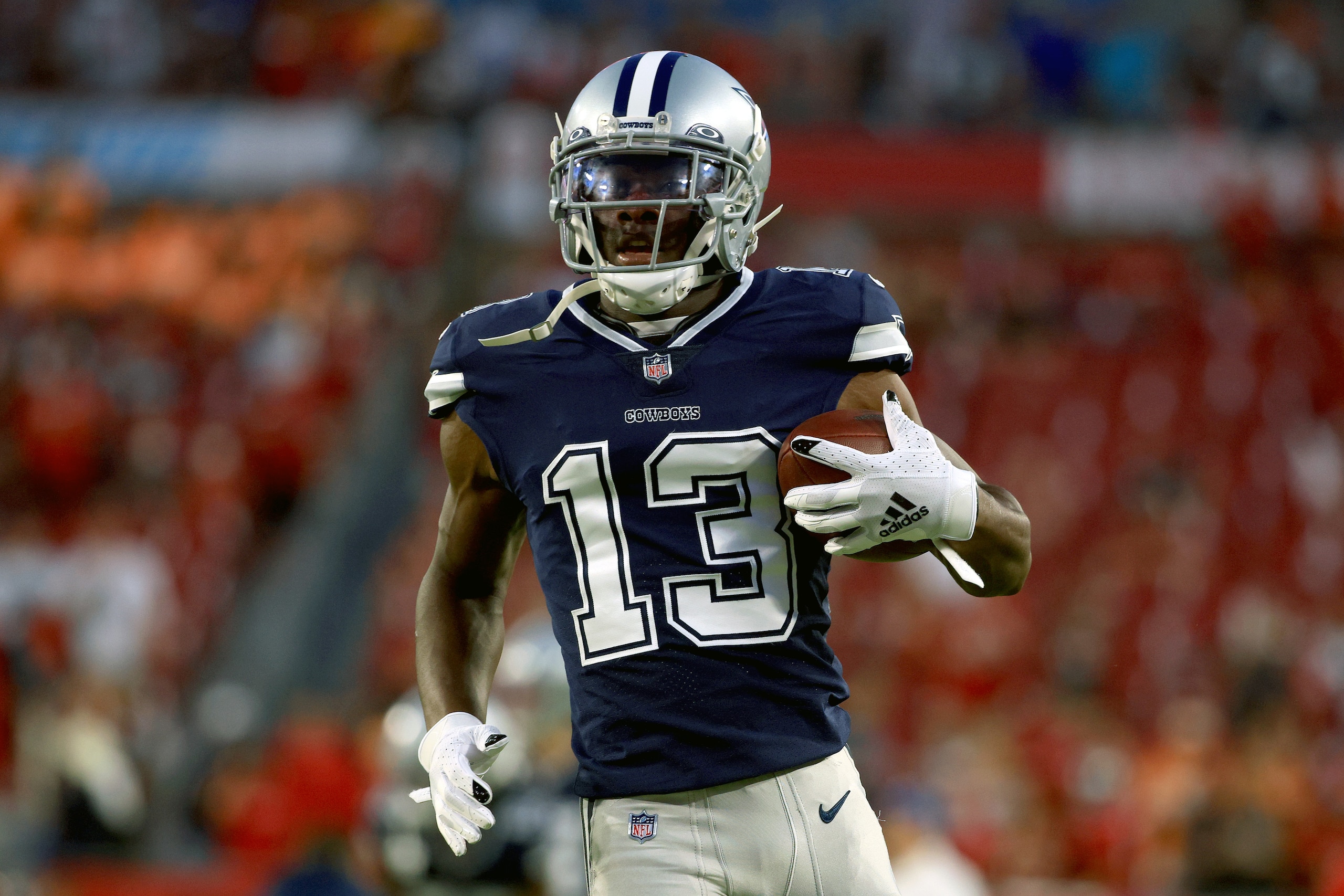 TAMPA, FLORIDA - SEPTEMBER 09: Michael Gallup #13 of the Dallas Cowboys warms up before the game against the Tampa Bay Buccaneers at Raymond James Stadium on September 09, 2021 in Tampa, Florida. (Photo by Mike Ehrmann/Getty Images) TAMPA, FLORIDA - SEPTEMBER 09: Michael Gallup #13 of the Dallas Cowboys warms up before the game against the Tampa Bay Buccaneers at Raymond James Stadium on September 09, 2021 in Tampa, Florida. (Photo by Mike Ehrmann/Getty Images)