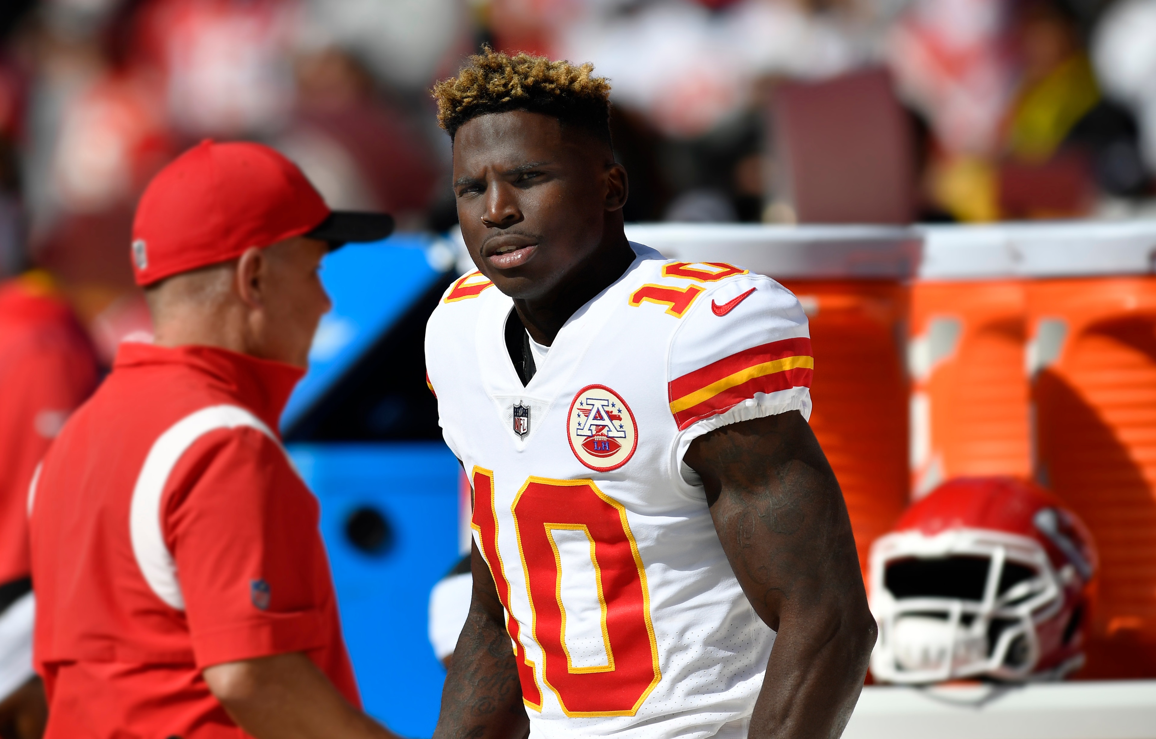 LANDOVER, MD - OCTOBER 17: Chiefs wide receiver Tyreek Hill (10) rests on the bench during the Kansas City Chiefs versus Washington Football Team National Football League game at FedEx Field on October 17, 2021 in Landover, MD. (Photo by Randy Litzinger/Icon Sportswire via Getty Images)