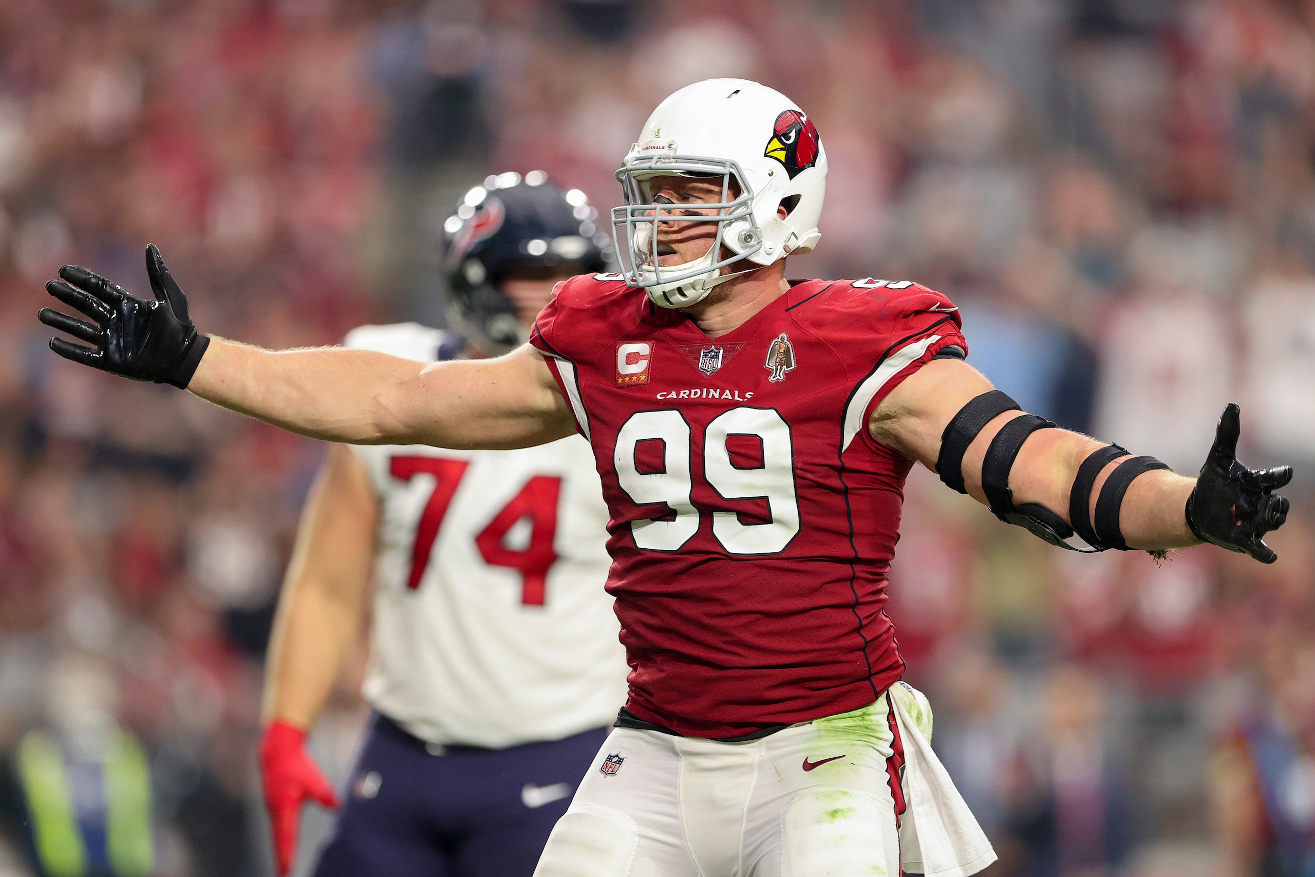 GLENDALE, ARIZONA - OCTOBER 24: J.J. Watt #99 of the Arizona Cardinals reacts after recording a sack in the second quarter against the Houston Texans in the game at State Farm Stadium on October 24, 2021 in Glendale, Arizona. (Photo by Christian Petersen/Getty Images)