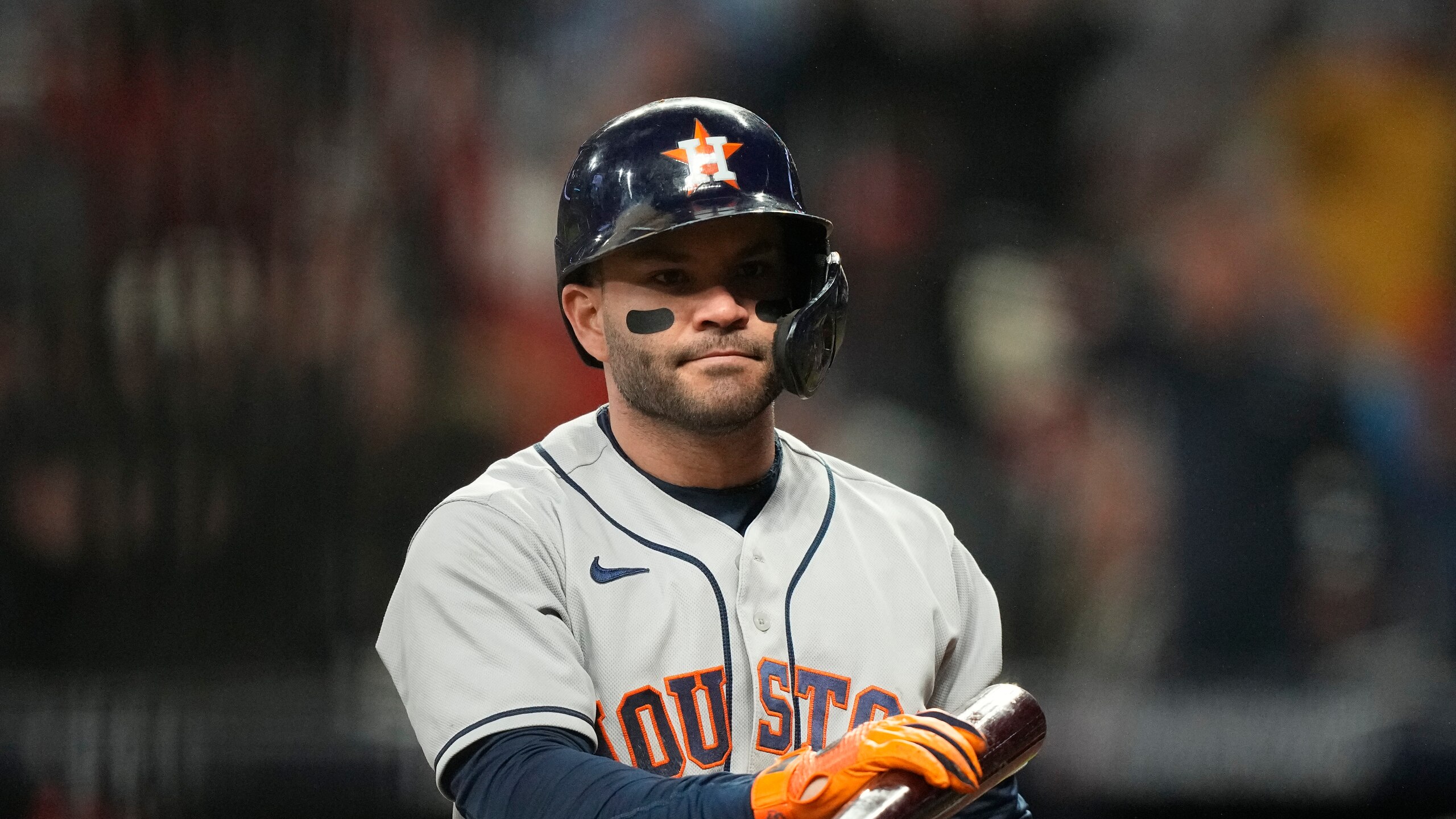 Houston Astros' Jose Altuve reacts after striking out during the sixth inning in Game 3 of baseball's World Series between the Houston Astros and the Atlanta Braves Friday, Oct. 29, 2021, in Atlanta. (AP Photo/David J. Phillip)