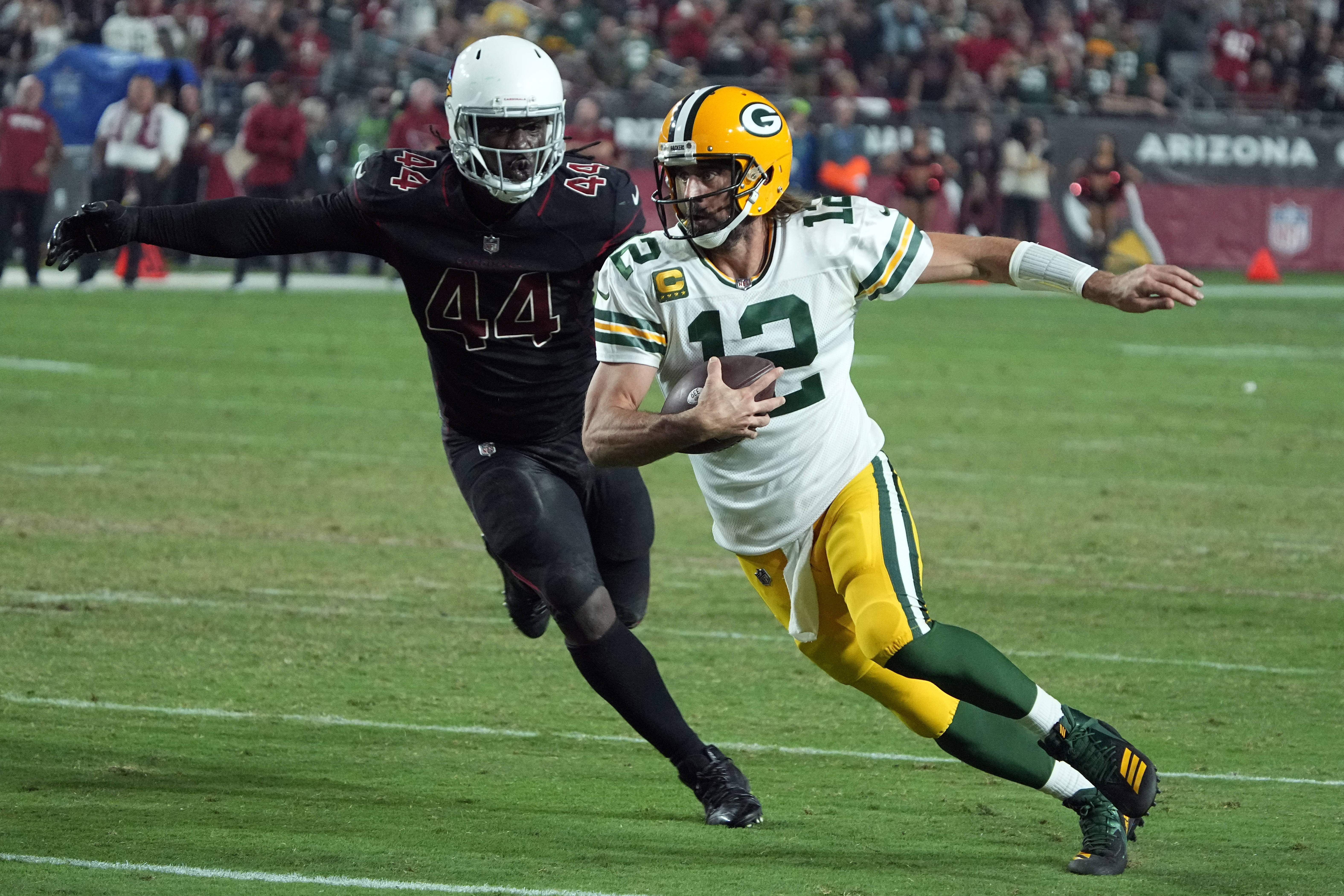 Green Bay Packers quarterback Aaron Rodgers (12) during the first half of an NFL football game against the Arizona Cardinals, Thursday, Oct. 28, 2021, in Glendale, Ariz. (AP Photo/Rick Scuteri)