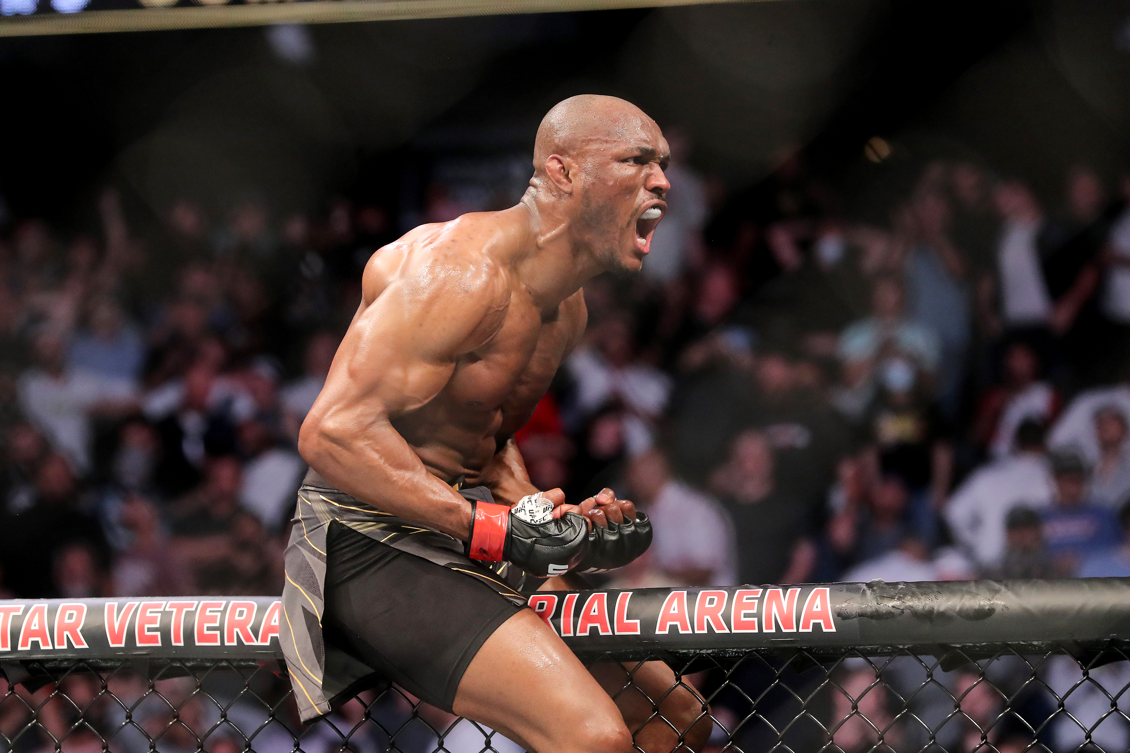 JACKSONVILLE, FL - APRIL 25: Kamaru Usman of Nigeria celebrates his victory over Jorge Masvidal of the United States during the Welterweight Title bout of UFC 261 at VyStar Veterans Memorial Arena on April 25, 2021 in Jacksonville, Florida.  (Photo by Alex Menendez/Getty Images)