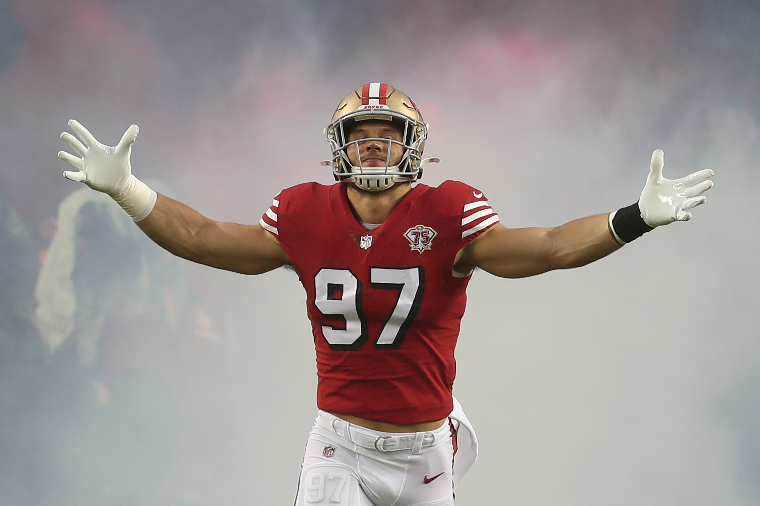 San Francisco 49ers defensive end Nick Bosa (97) is introduced before an NFL football game against the Indianapolis Colts in Santa Clara, Calif., Sunday, Oct. 24, 2021. (AP Photo/Jed Jacobsohn) San Francisco 49ers defensive end Nick Bosa (97) is introduced before an NFL football game against the Indianapolis Colts in Santa Clara, Calif., Sunday, Oct. 24, 2021. (AP Photo/Jed Jacobsohn)