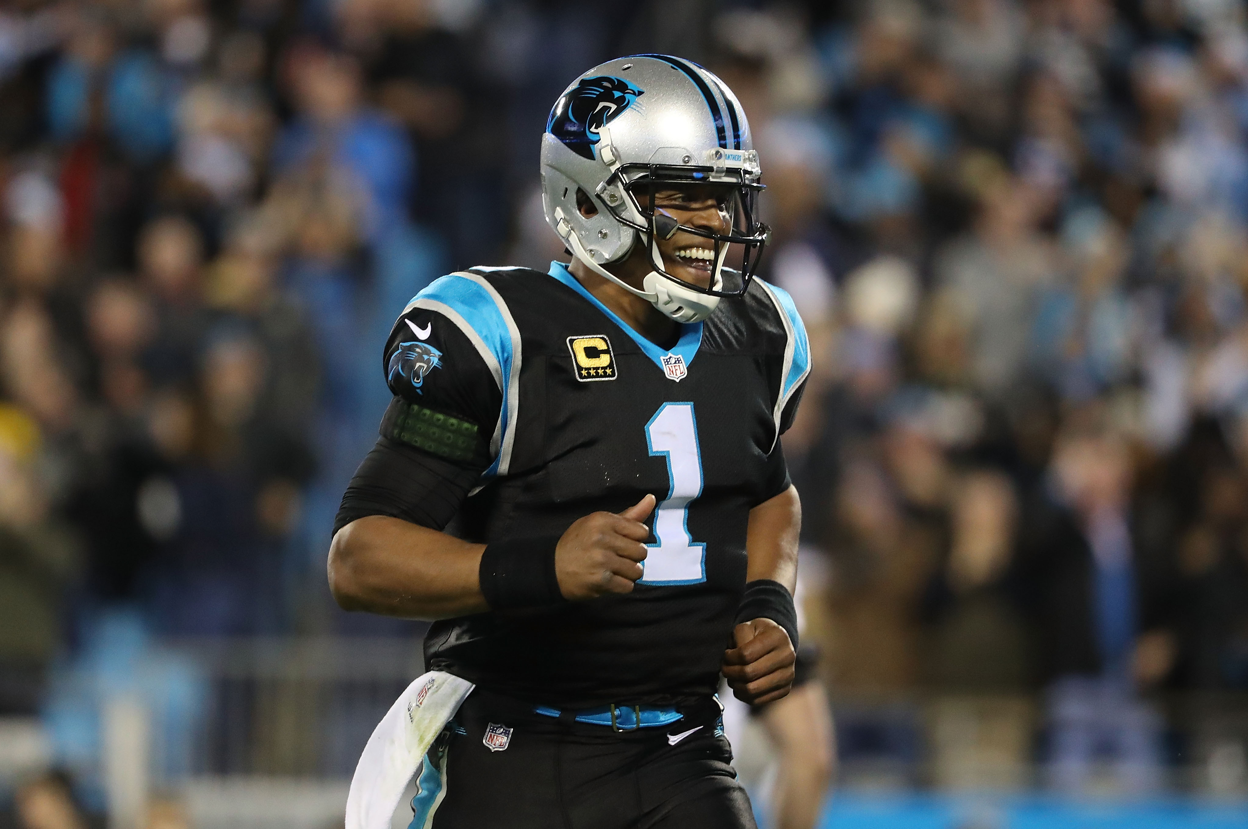 CHARLOTTE, NC - DECEMBER 17:  Cam Newton #1 of the Carolina Panthers reacts after a touchdown against the New Orleans Saints in the first quarter during their game at Bank of America Stadium on December 17, 2018 in Charlotte, North Carolina.  (Photo by Streeter Lecka/Getty Images)